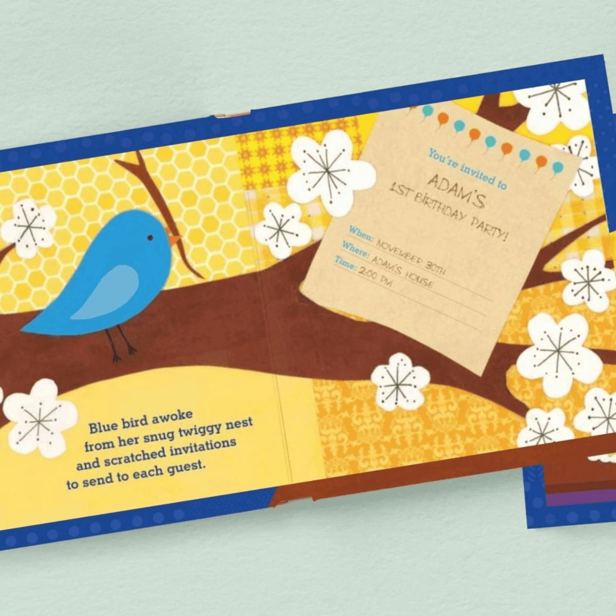 personalised birthday board book with an image of the illustrations inside the book