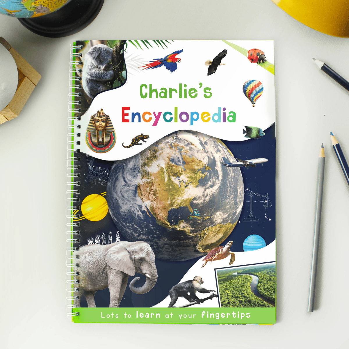 personalised children's encyclopedia showing the child's name on the front cover