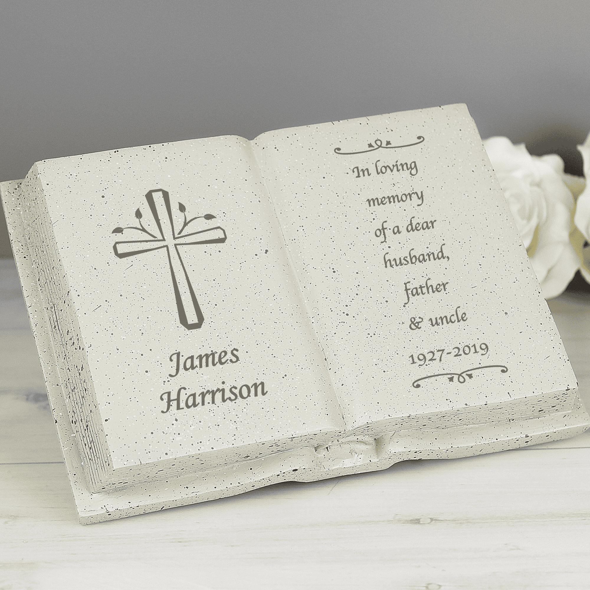 personalised cross memorial stone ornament engraved with a name below the cross on the left side and any message over 7 lines on the right