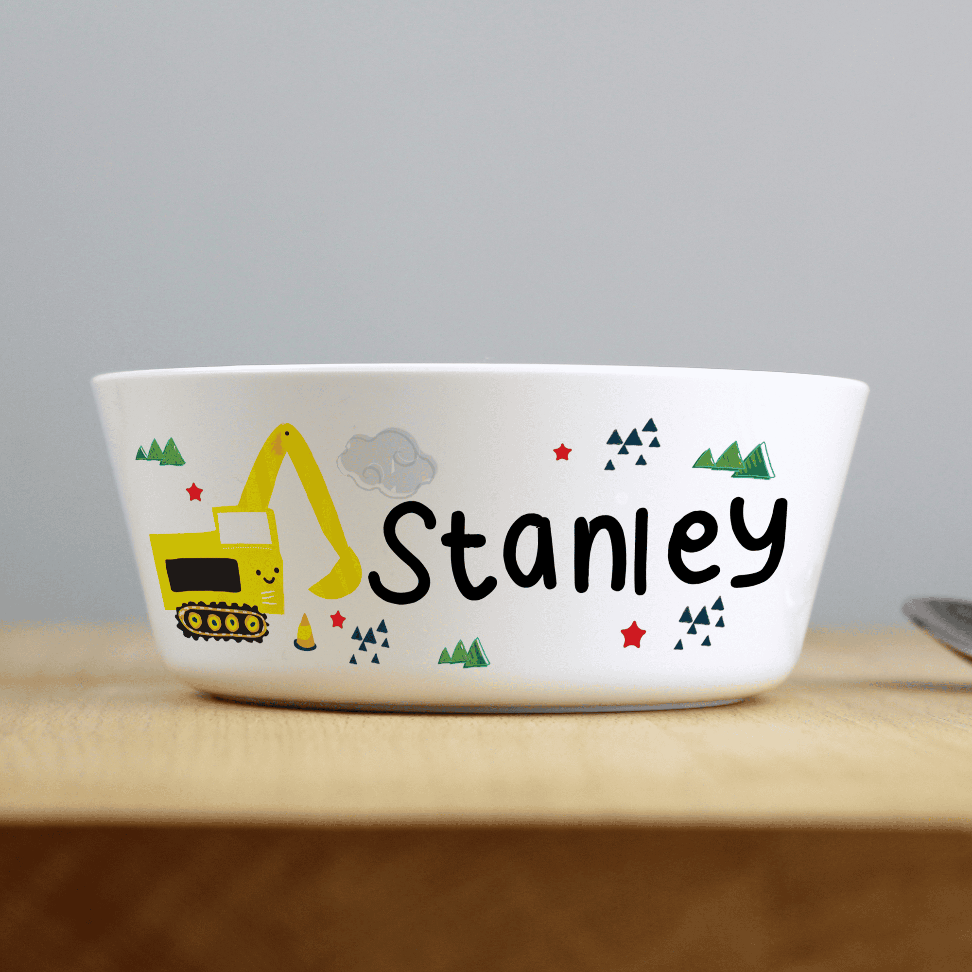 personalised plastic digger bowl with any name personalised on the side beside a digger image