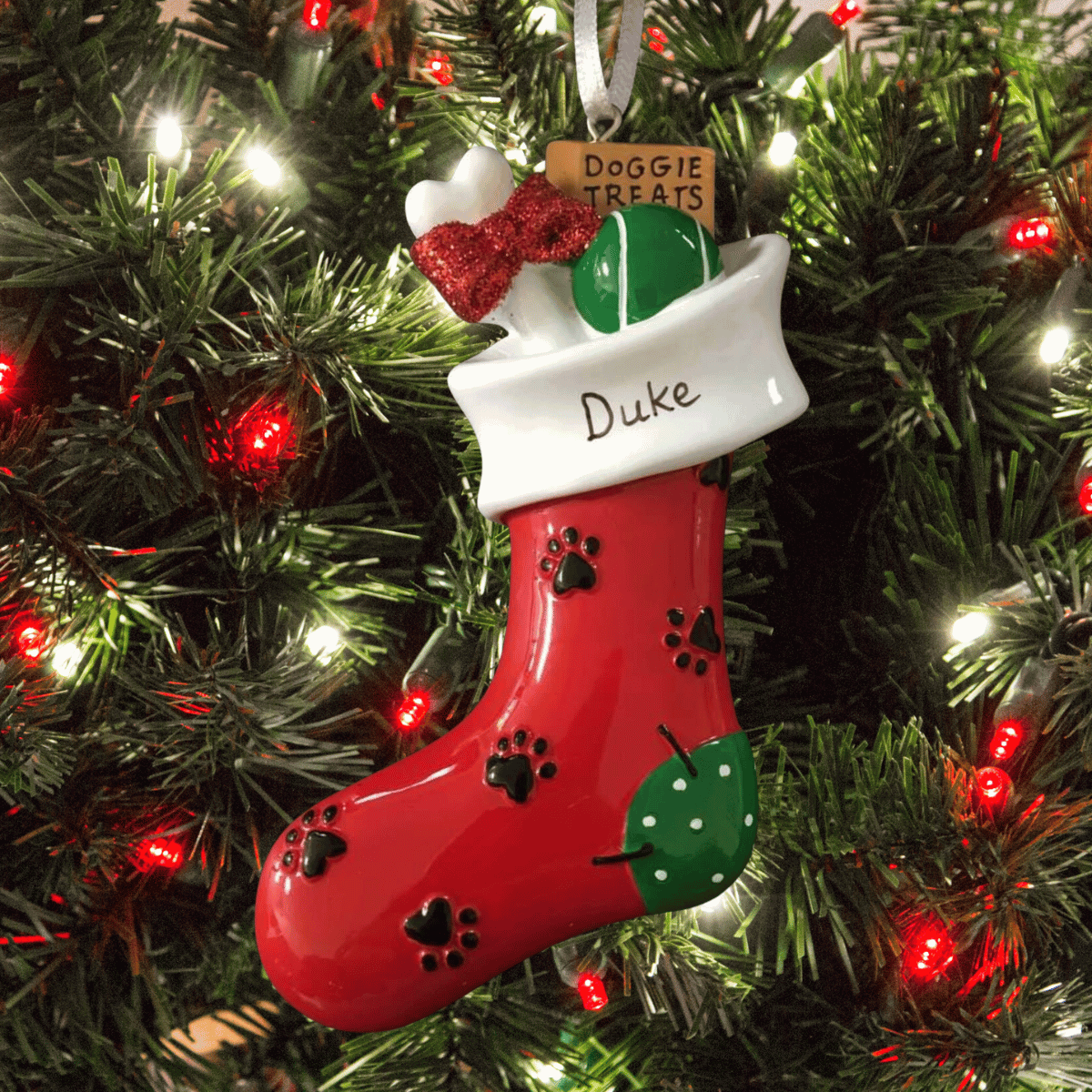 personalised dog stocking christmas tree decoration showing that the dog's name can be personalised on the white part of the red stocking