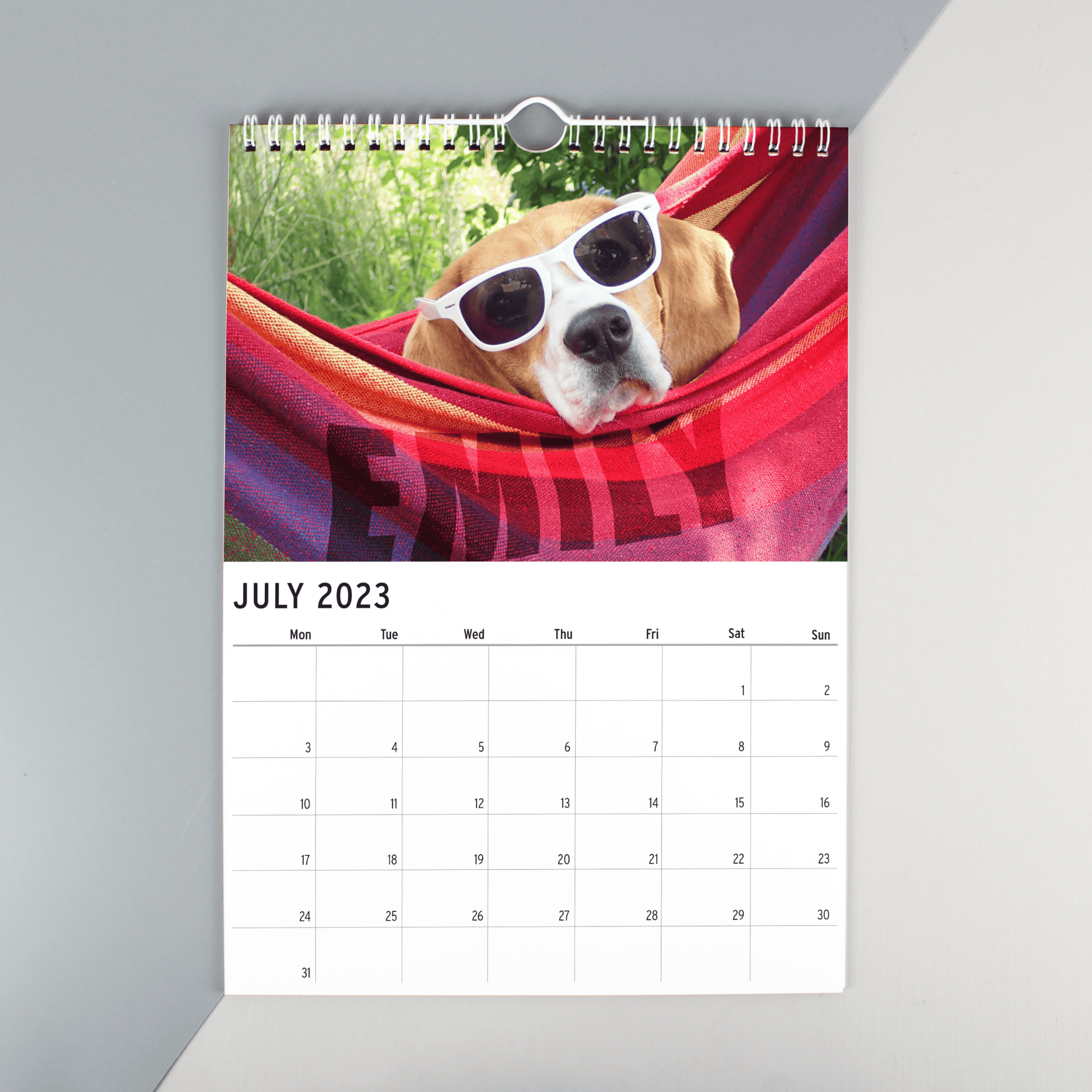 personalised a4 dog wall calendar with any name personalised on each month