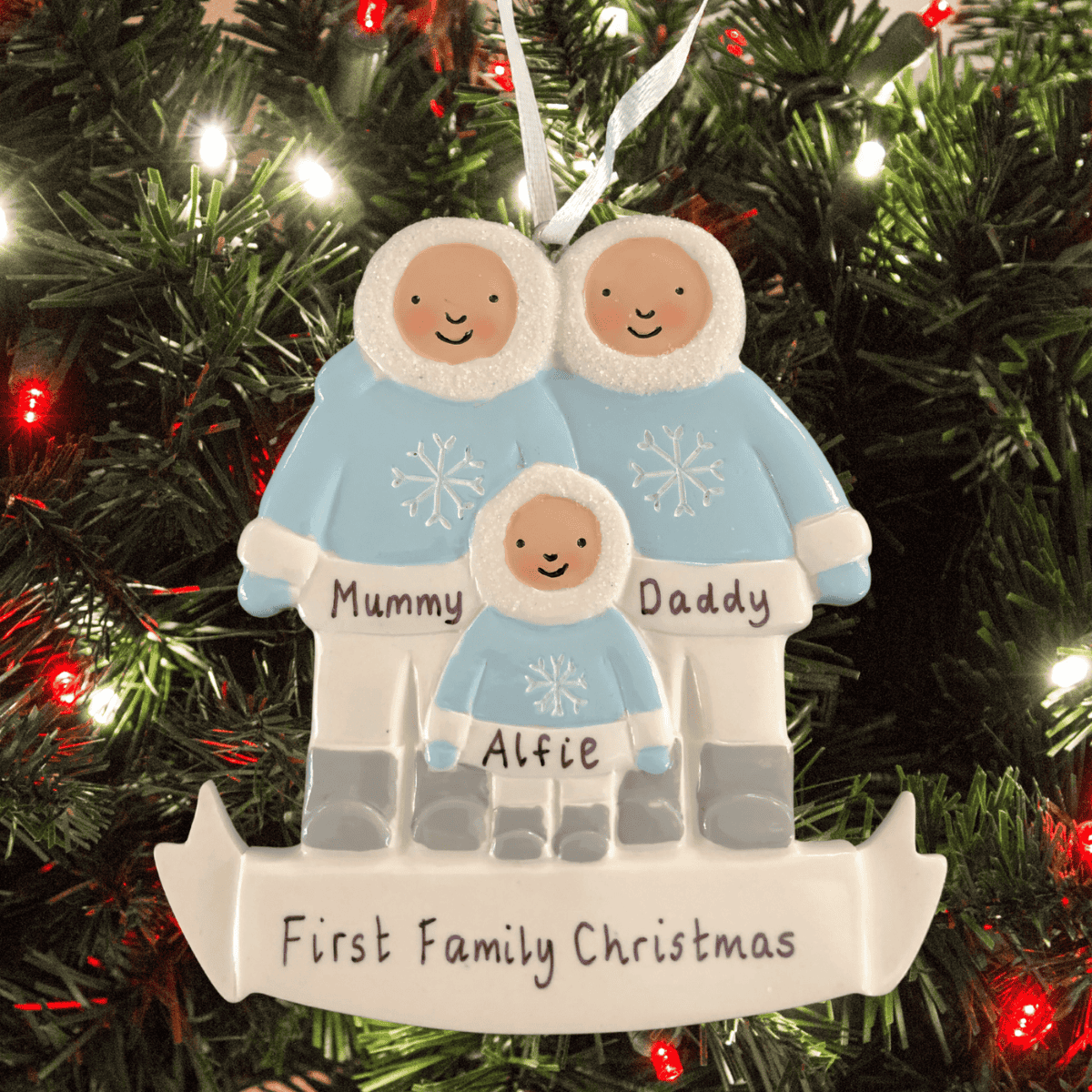 family of 3 personalised chirstmas tree decoration on a christmas tree background