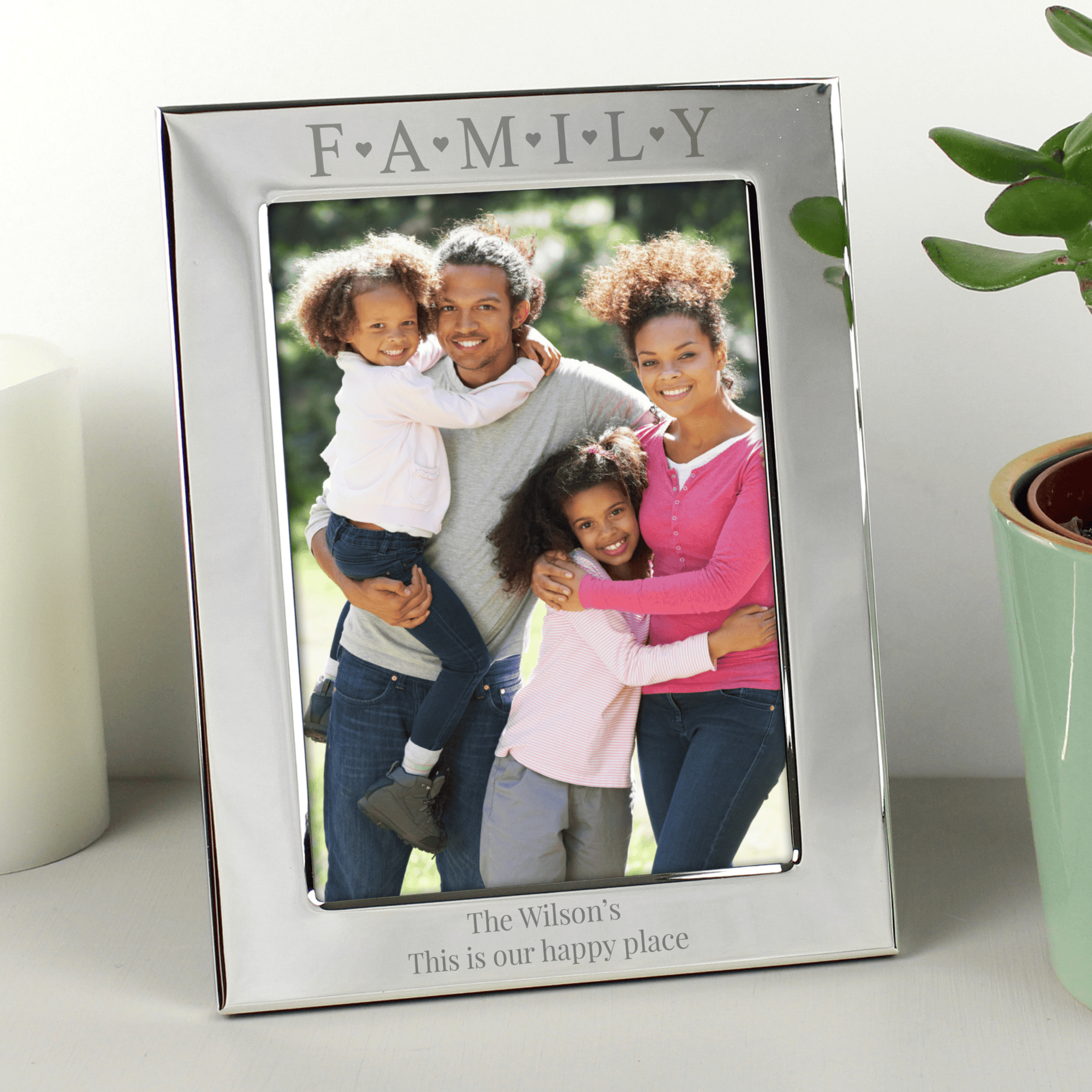 personalised family photo frame engraved with a message over 2 lines under the photo
