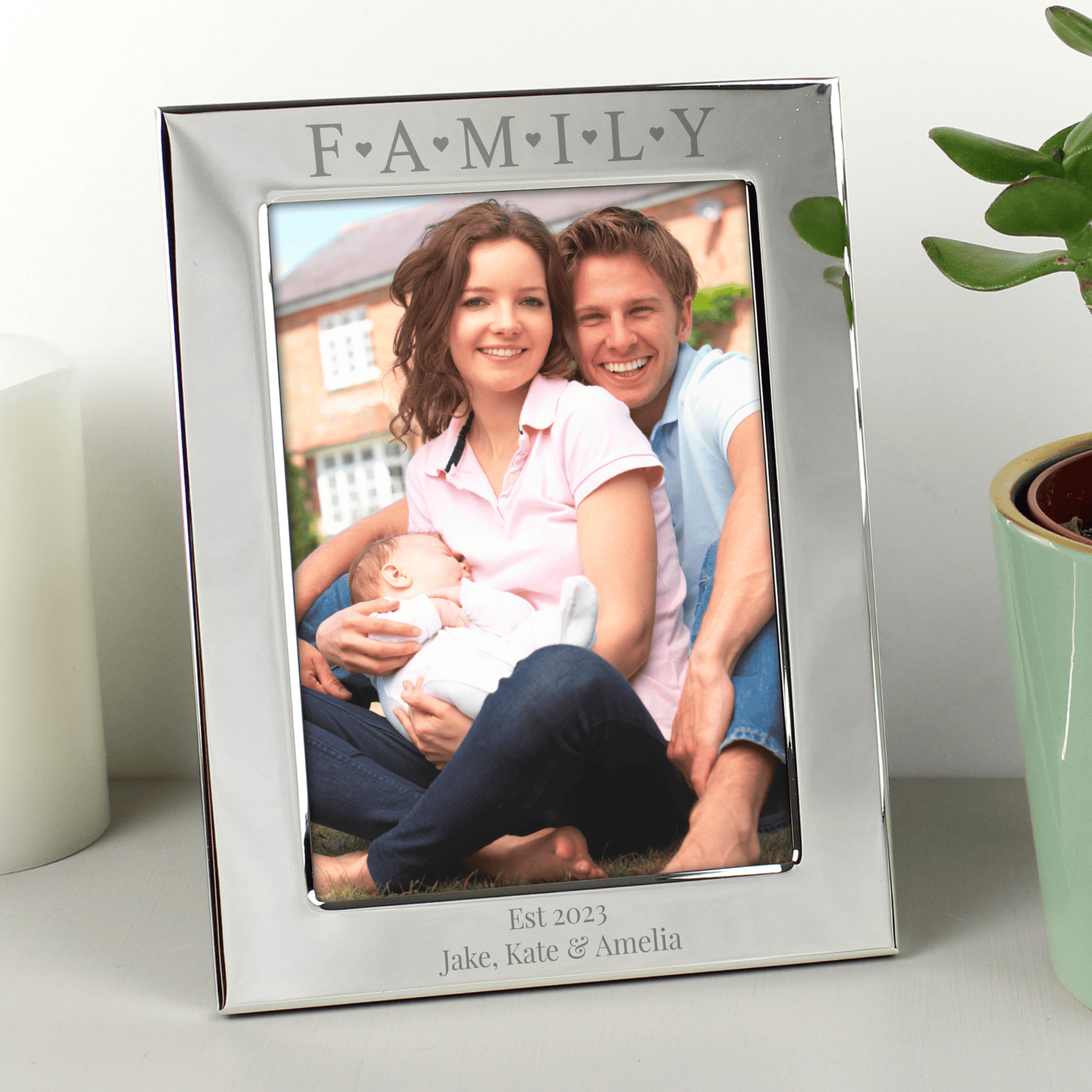 personalised family photo frame engraved with a message over 2 lines under the photo