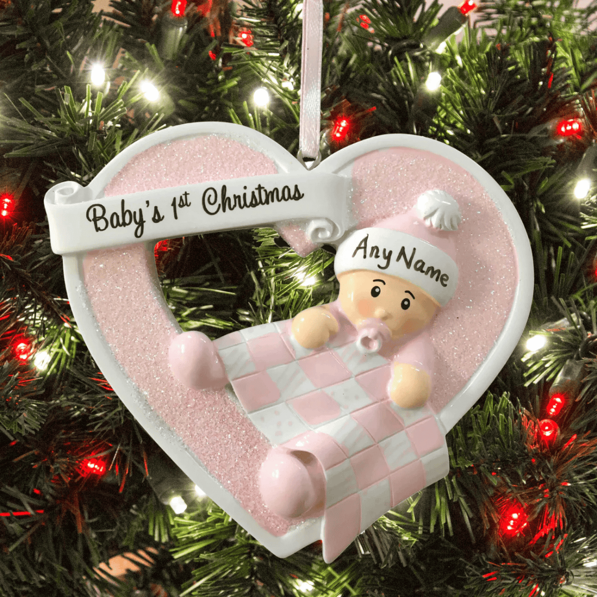 personalised christmas tree decoration for a baby girl with a pink heart