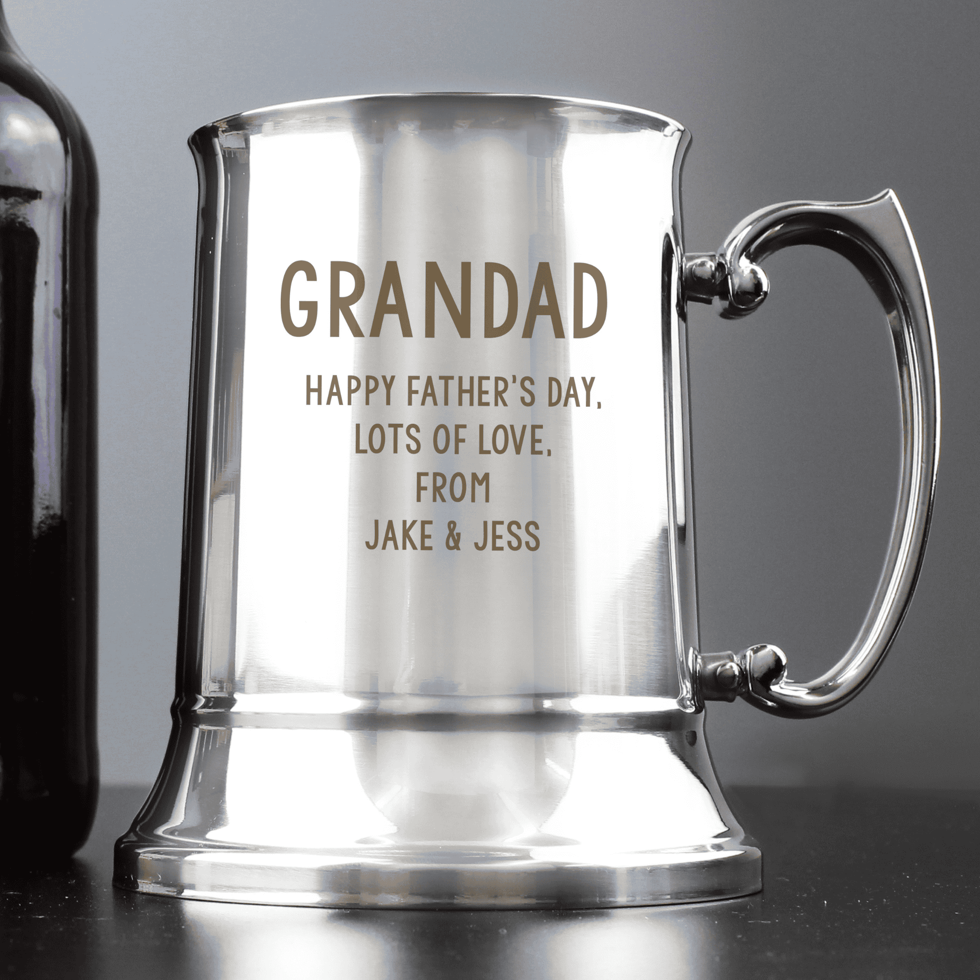 engraved steel tankard personalised with a name in larger font and a message over 4 lines on the front