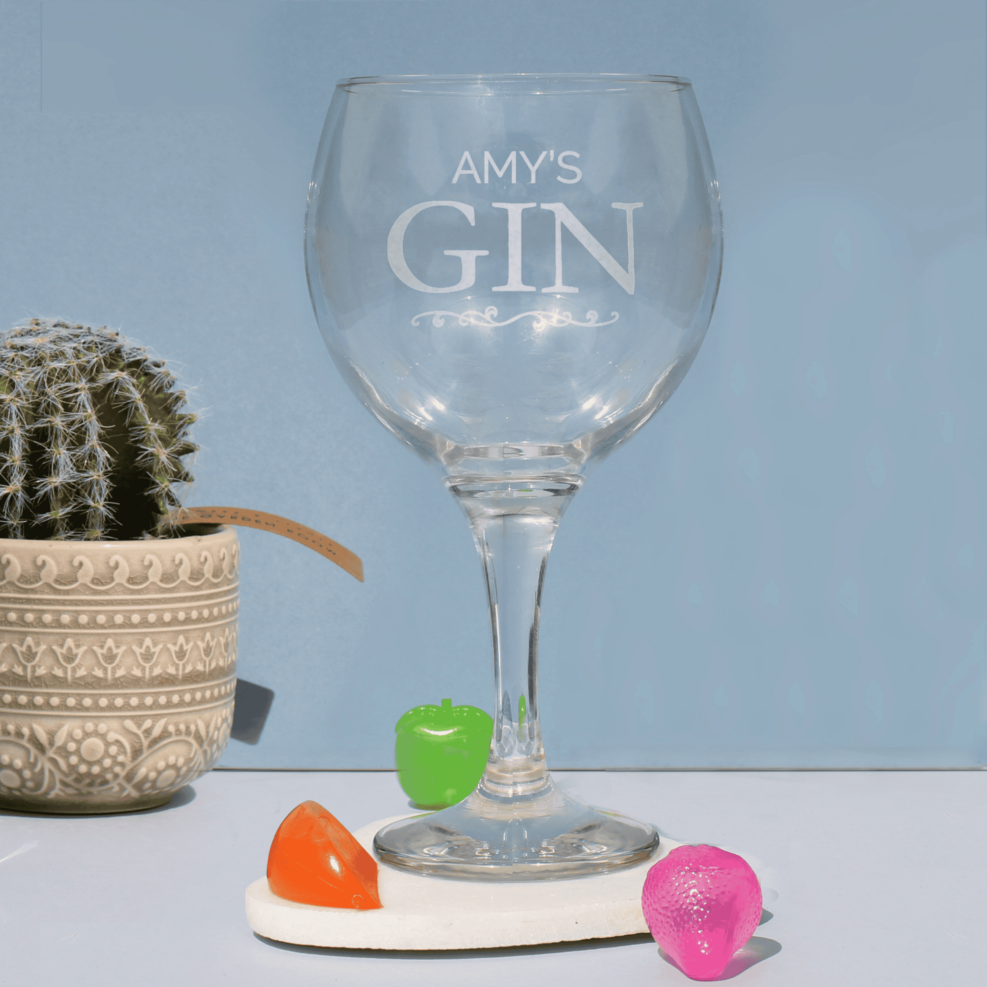 personalised gin balloon glass with the person's name engraved above the word gin