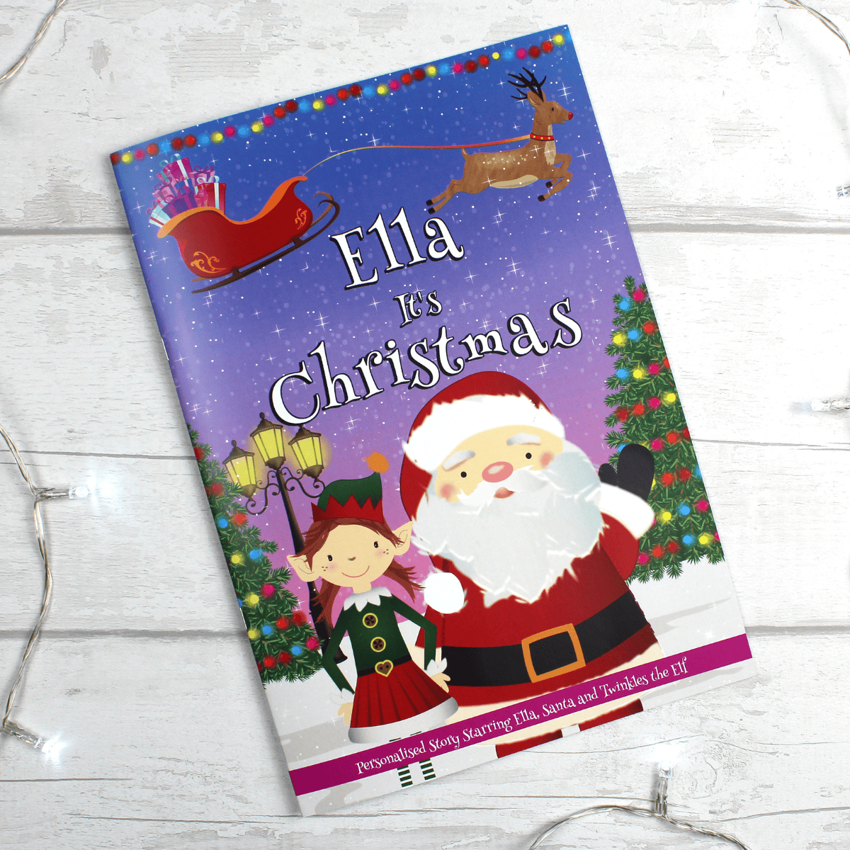 personalised children's christmas story book with the child's name on the front cover