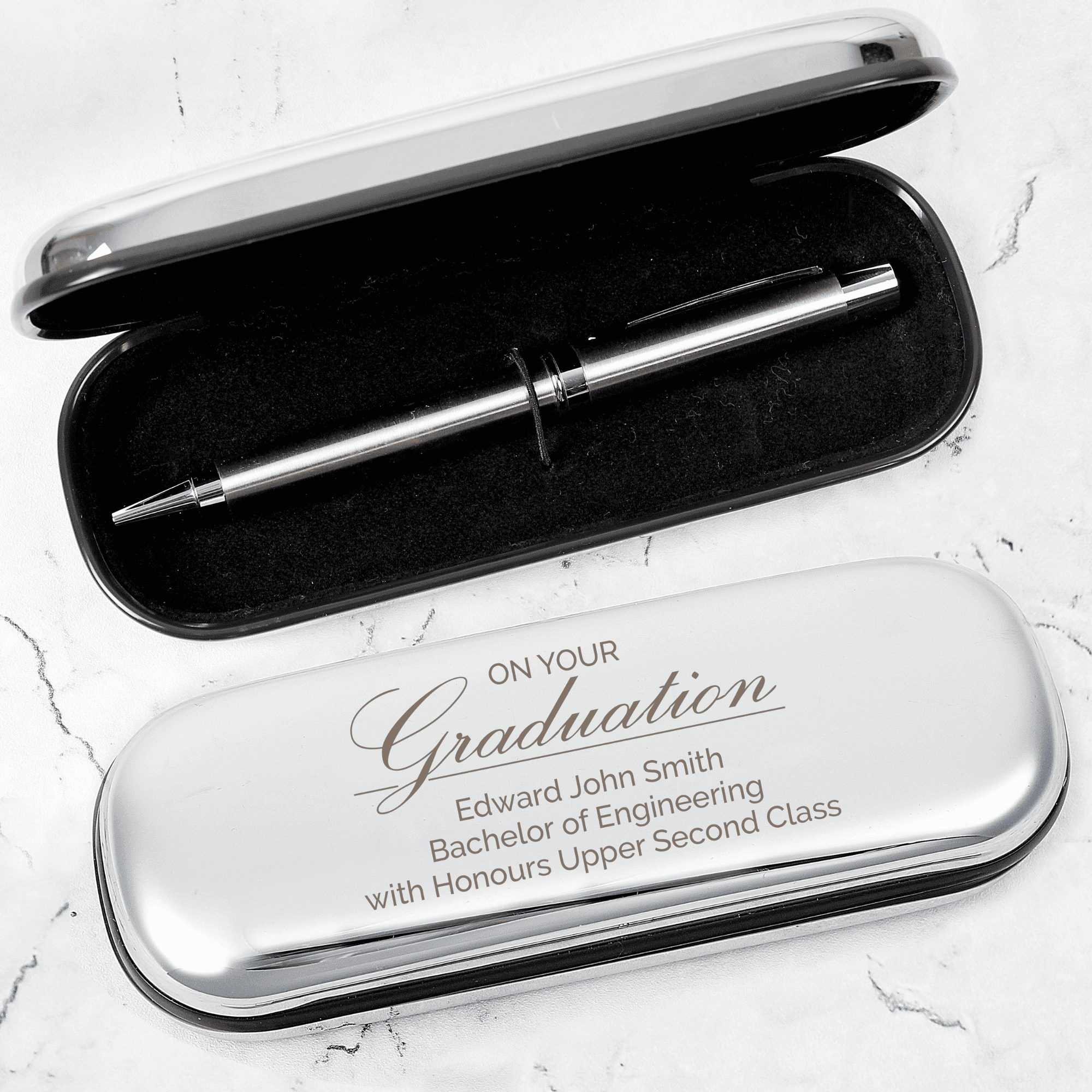personalised graduation pen box and pen set. the box is engraved with any message over 3 lines