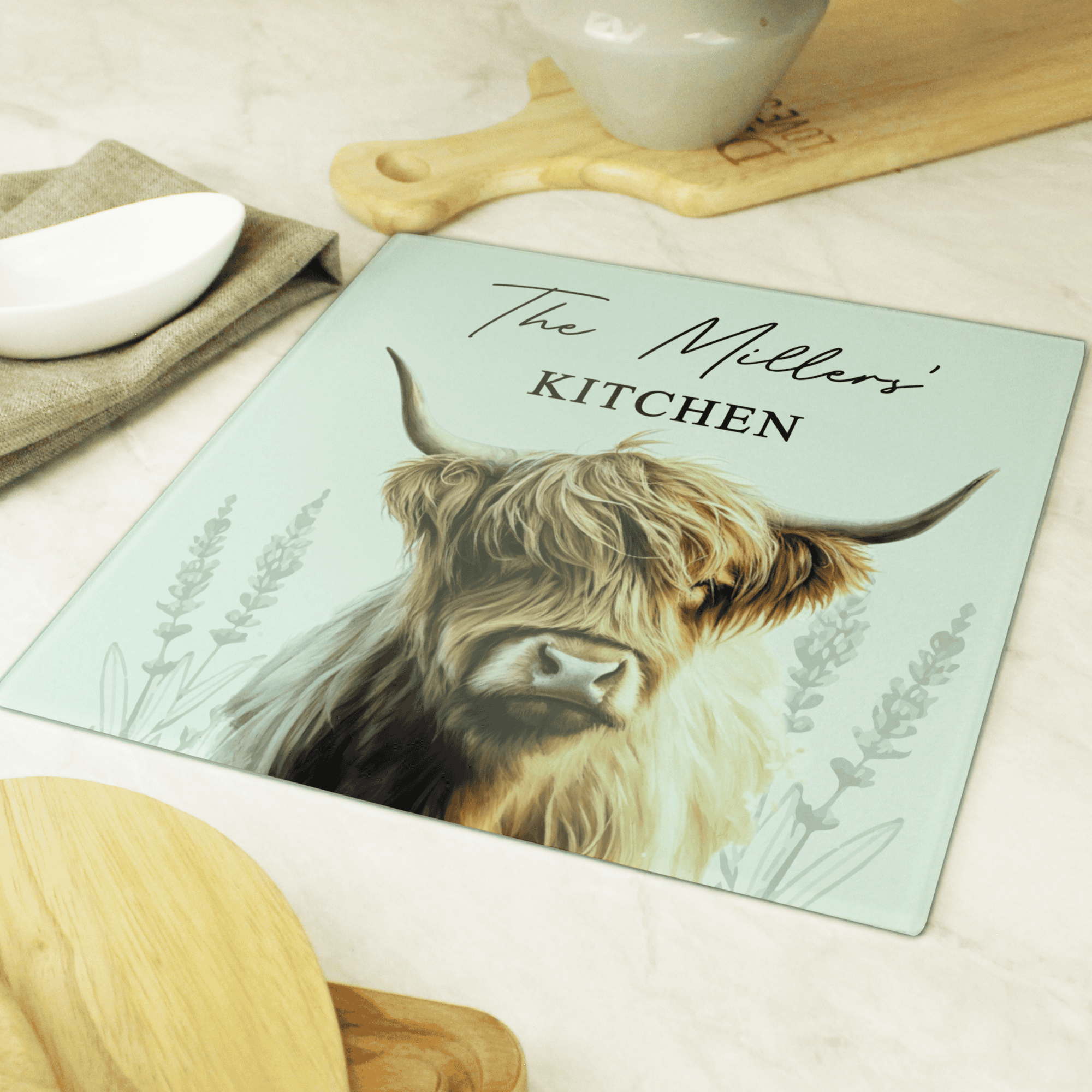 personalised highland cow glass chopping board
