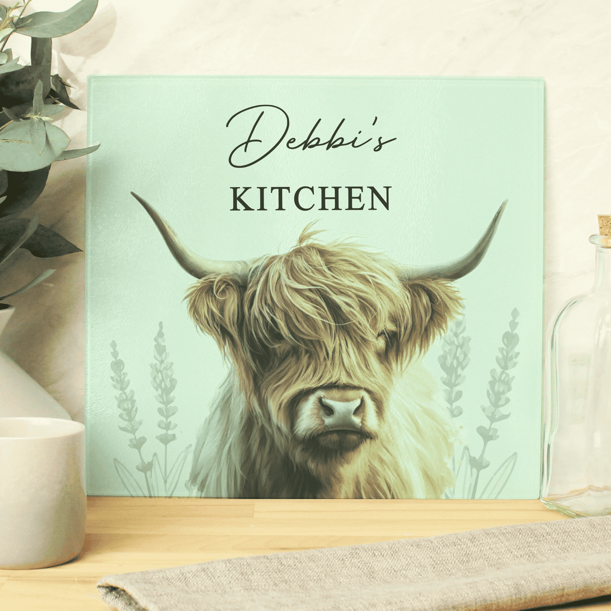 personalised highland cow glass chopping board