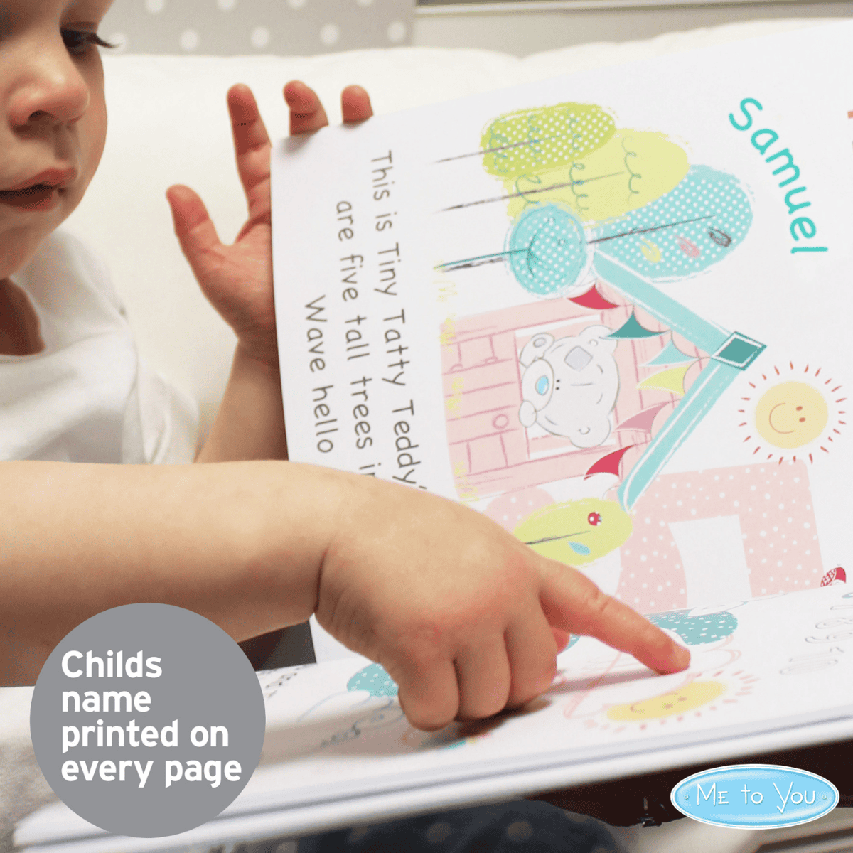 personalised Tiny Tatty learning book showing the inside page with a child pointing to their name on it