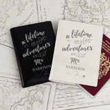 personalised lifetime of adventure passport cover set. one is black. one is cream