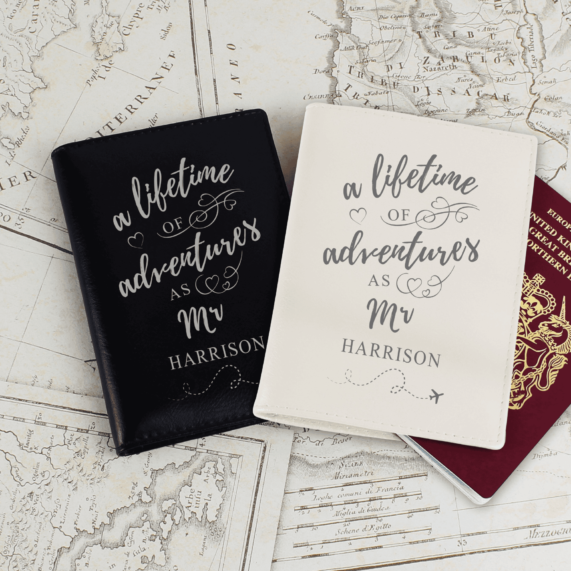 personalised lifetime of adventure passport cover set. one is black. one is cream
