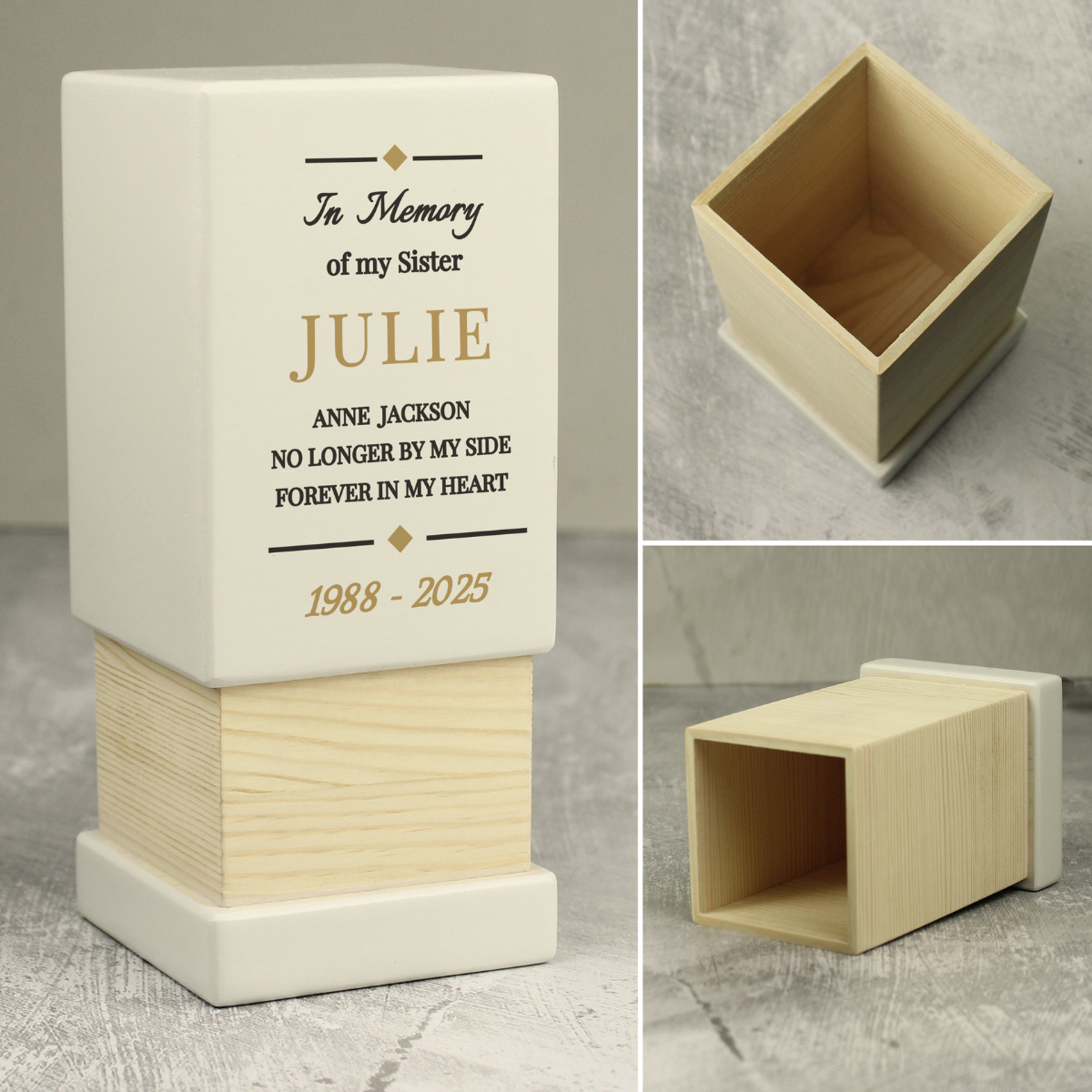 personalised white wooden urn with the personalisation on the front in black and gold writing