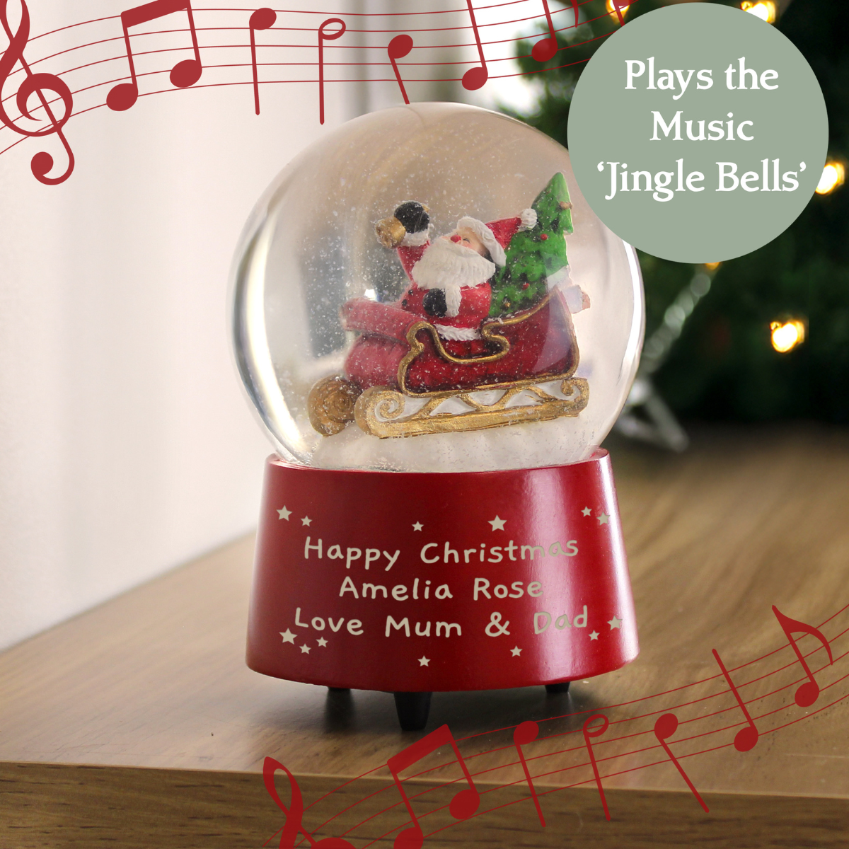 personalised musical snow globe showing that it can be personalised with any message over 3 lines.