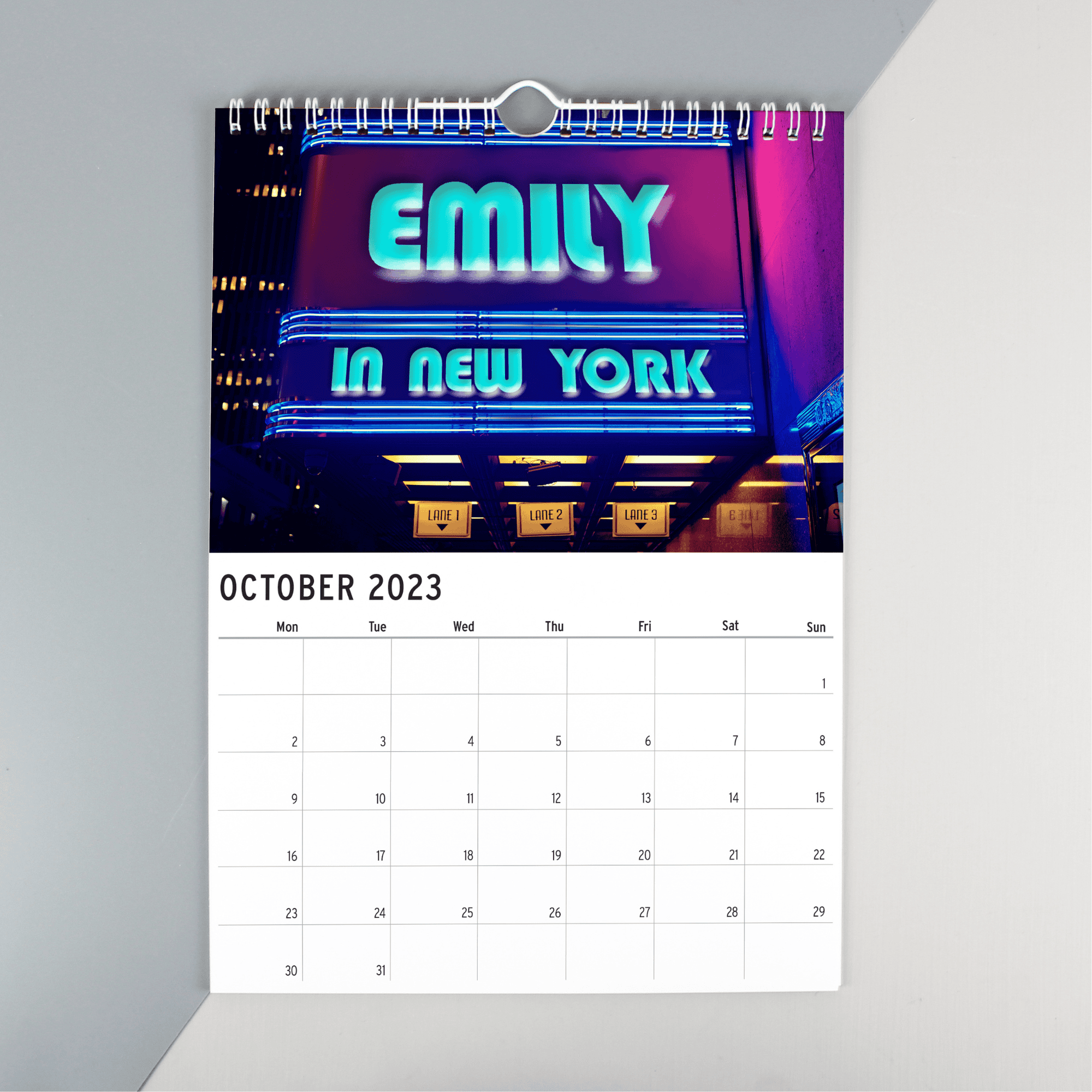 personalised a4 wall calendar of new york with the person's name on every page