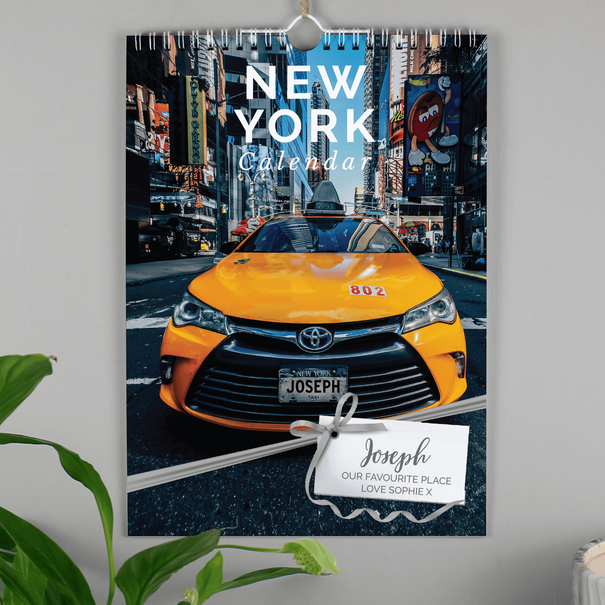 personalised a4 wall calendar of new york with the person's name on every page