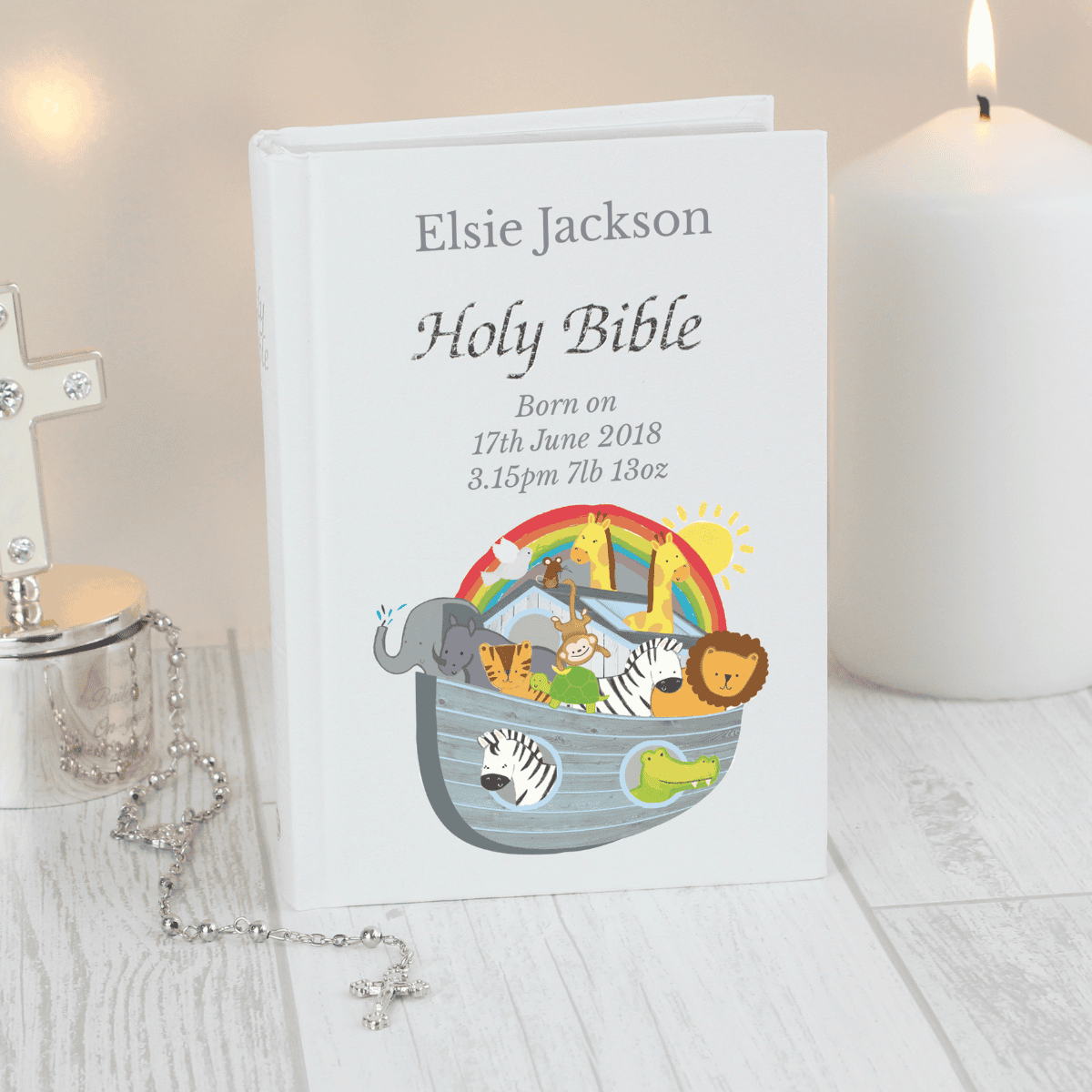 personalised Noah's ark bible showing the front cover personalised over three lines with the child's name at the top