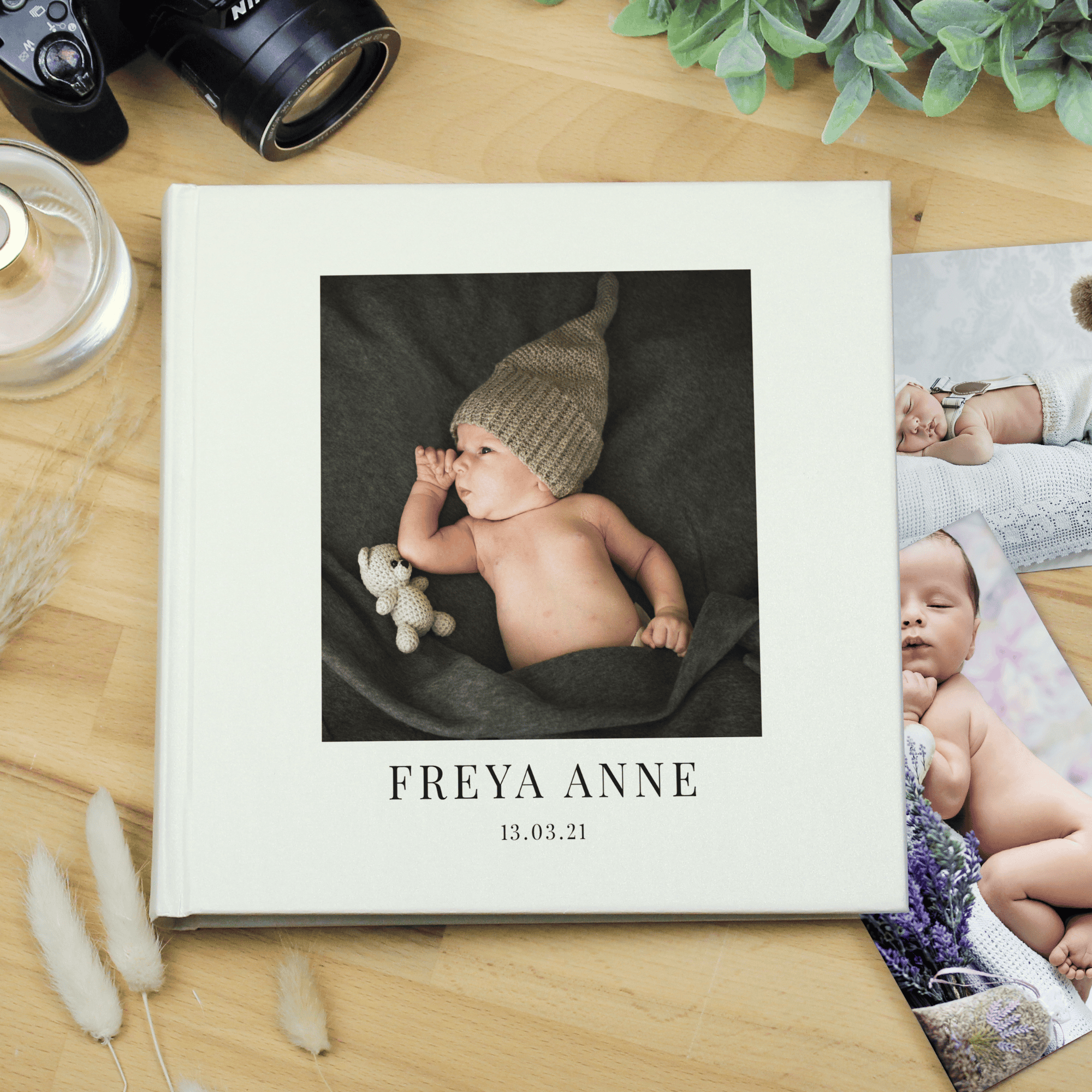 personalised photo upload album showing young baby on front