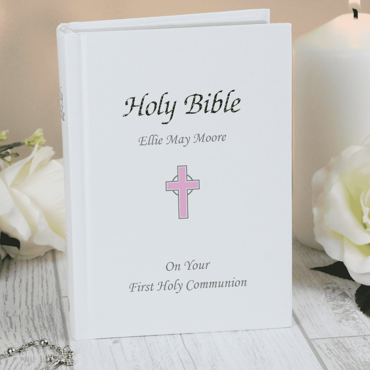 personalised pink cross bible personalised with any message over 3 lines on the front cover.