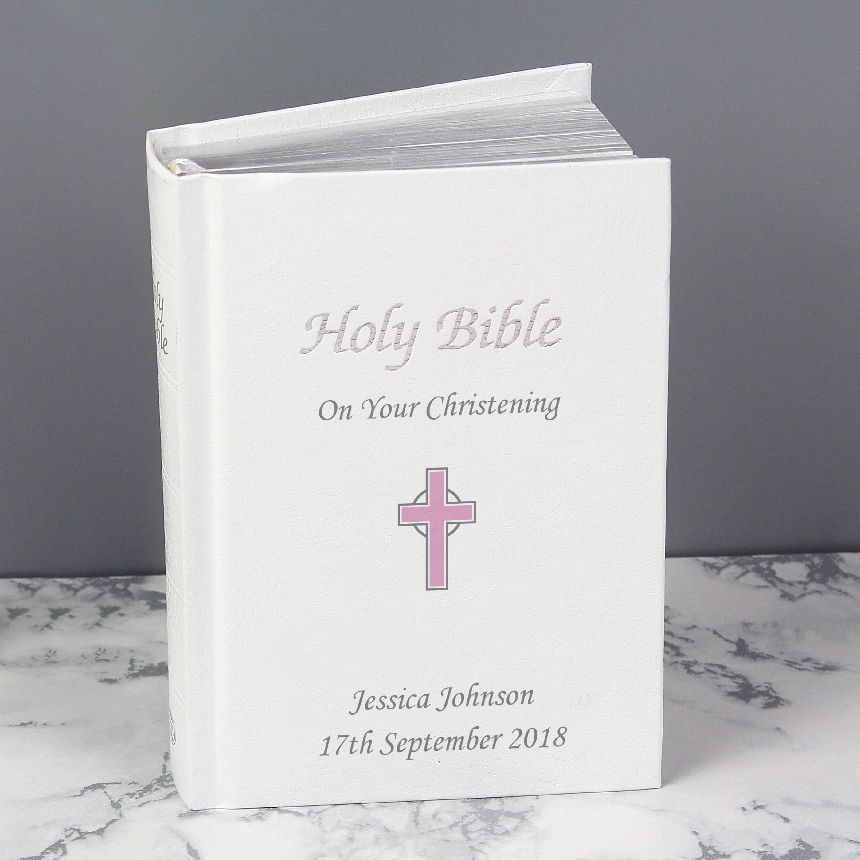 personalised pink cross bible personalised with any message over 3 lines on the front cover.