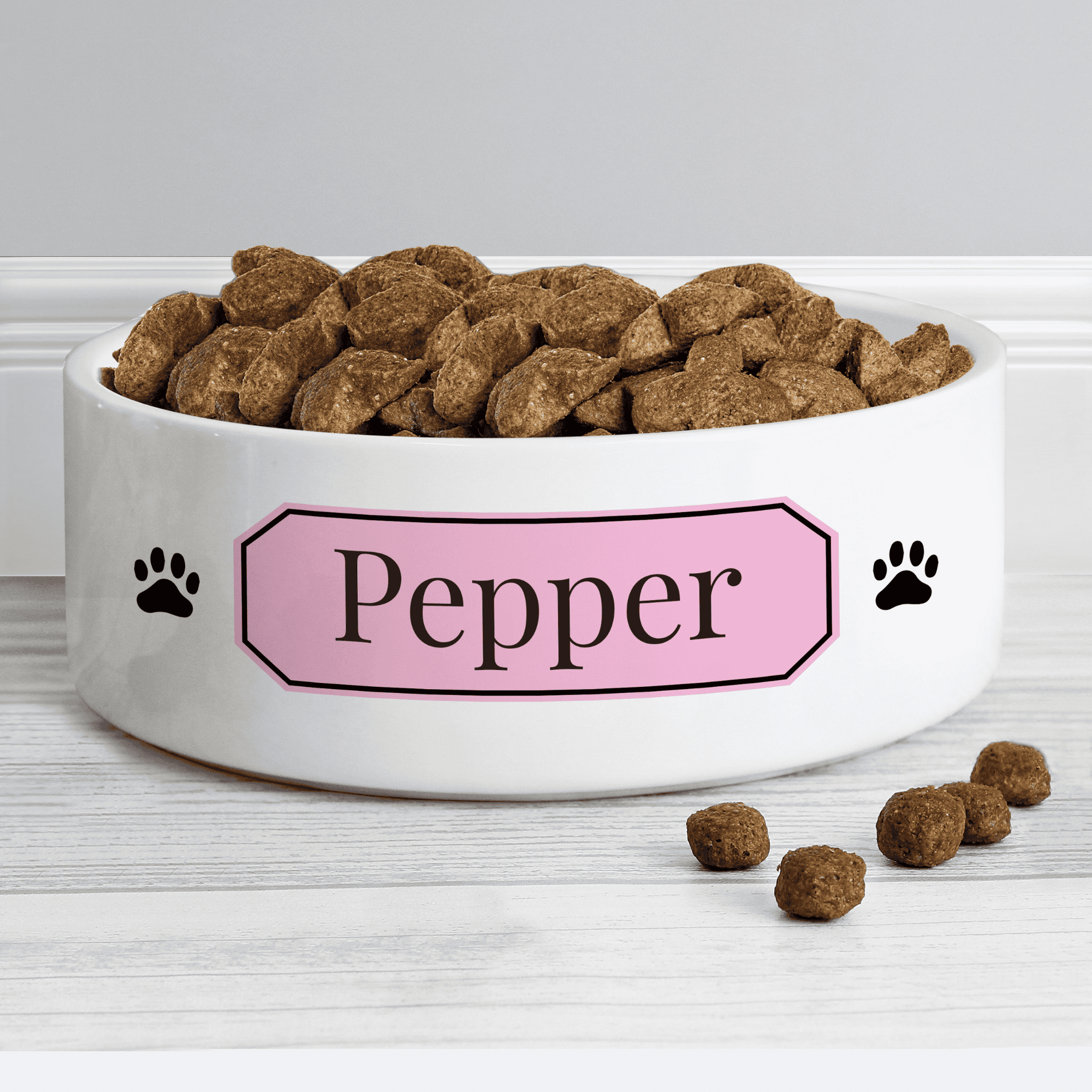 personalised ceramic pet bowl with any name on a pink banner