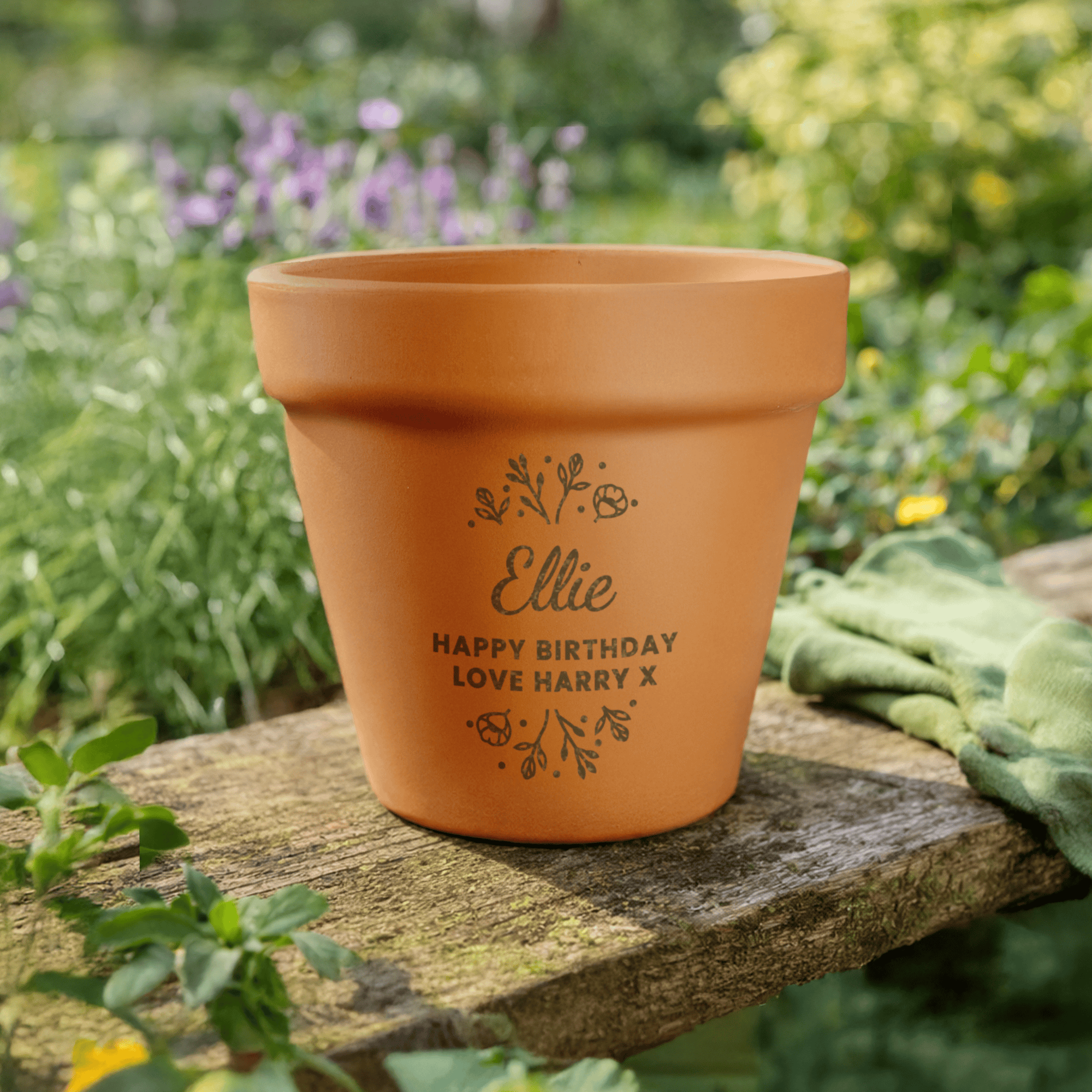 personalised terracotta plant pot with a message over 3 lines