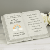 personalised rainbow memorial stone with the persons names and date on the left beside a rainbow image and any message engraved over 8 lines on the right hand side
