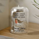 personalised robins appear memorial glass tealight holder with a feather in the centre