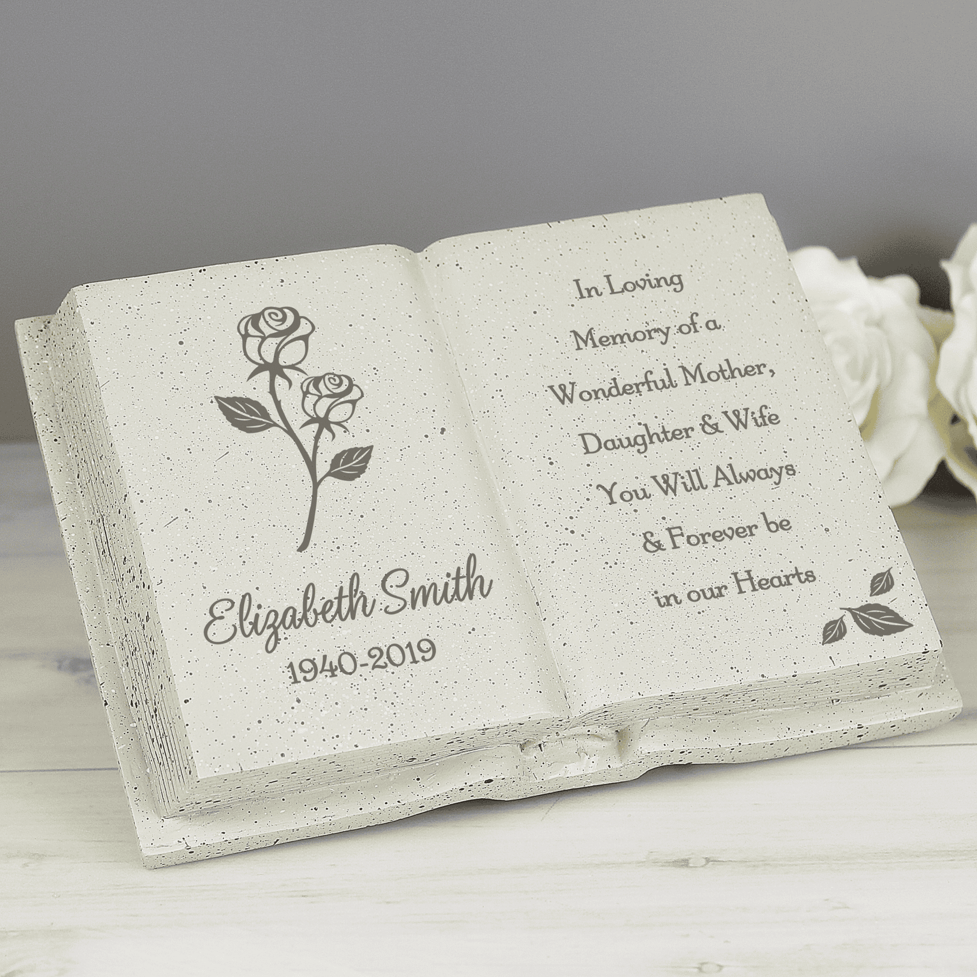 personalised rose memorial stone book engraved with a name, date and any message over 7 lines