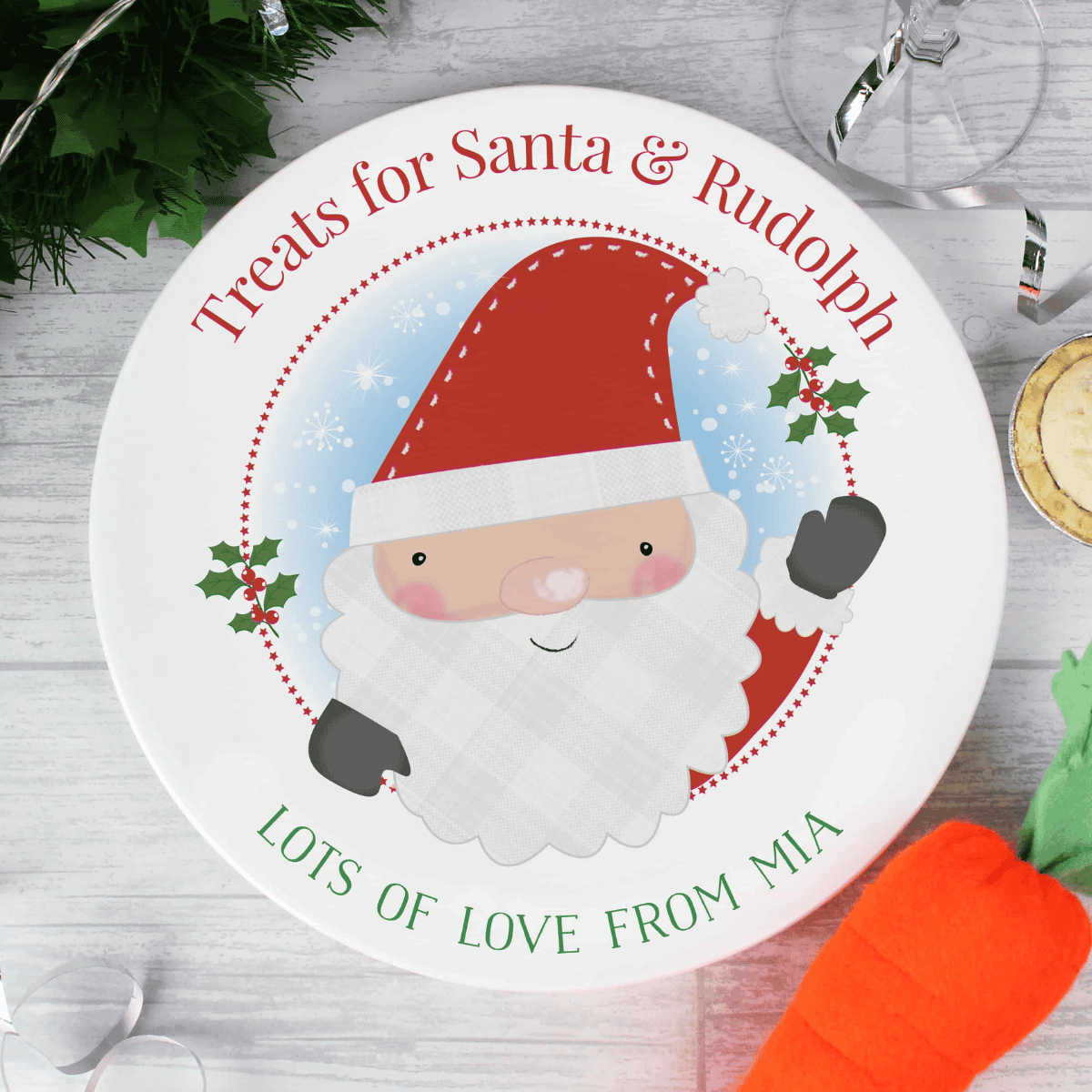 round christmas eve plate with a santa image in the centre, personalised above and below the image