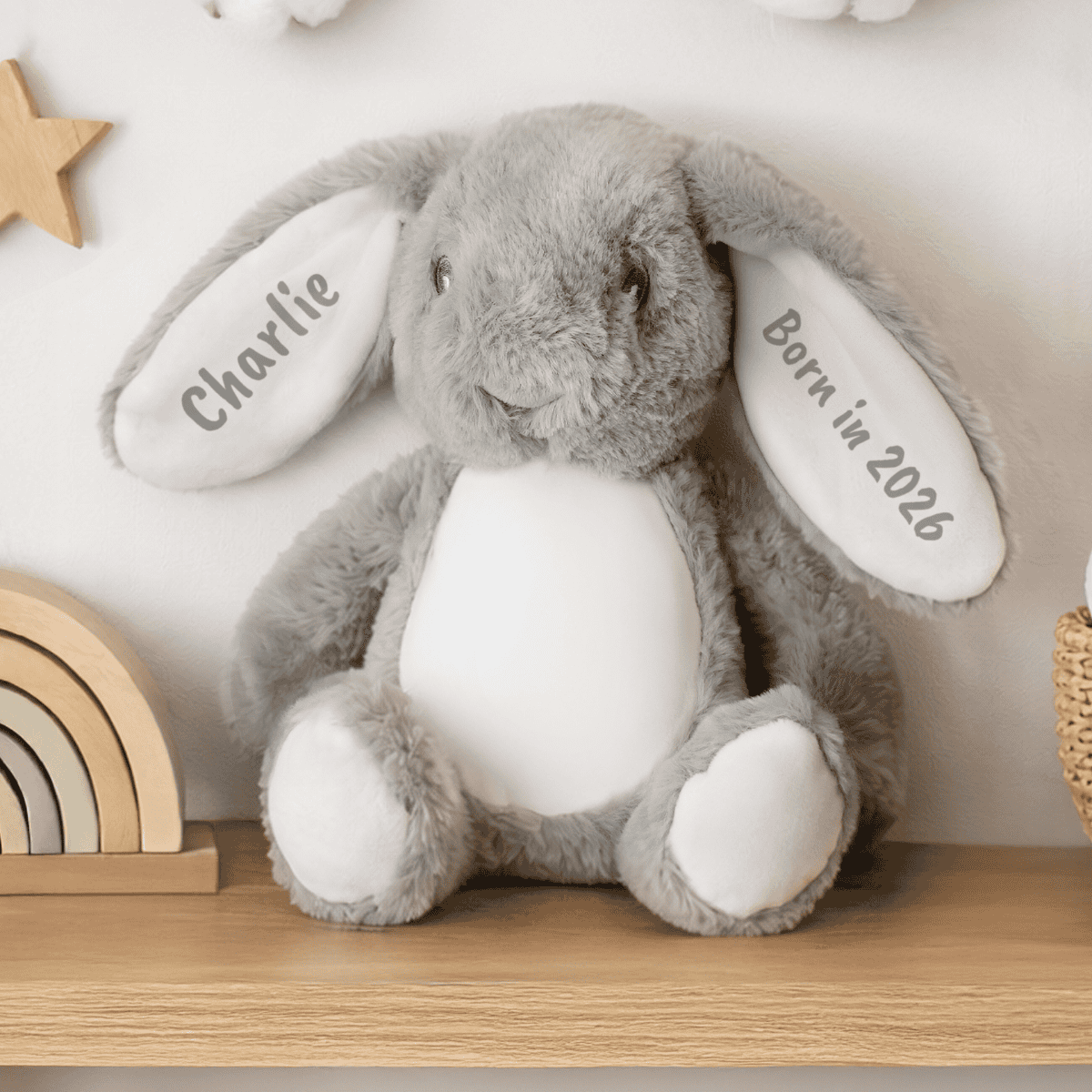 personalised soft toy bunny showing it sitting on a shelf