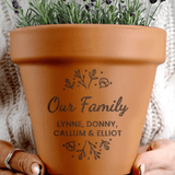 personalised terracotta plant pot with a message over 3 lines