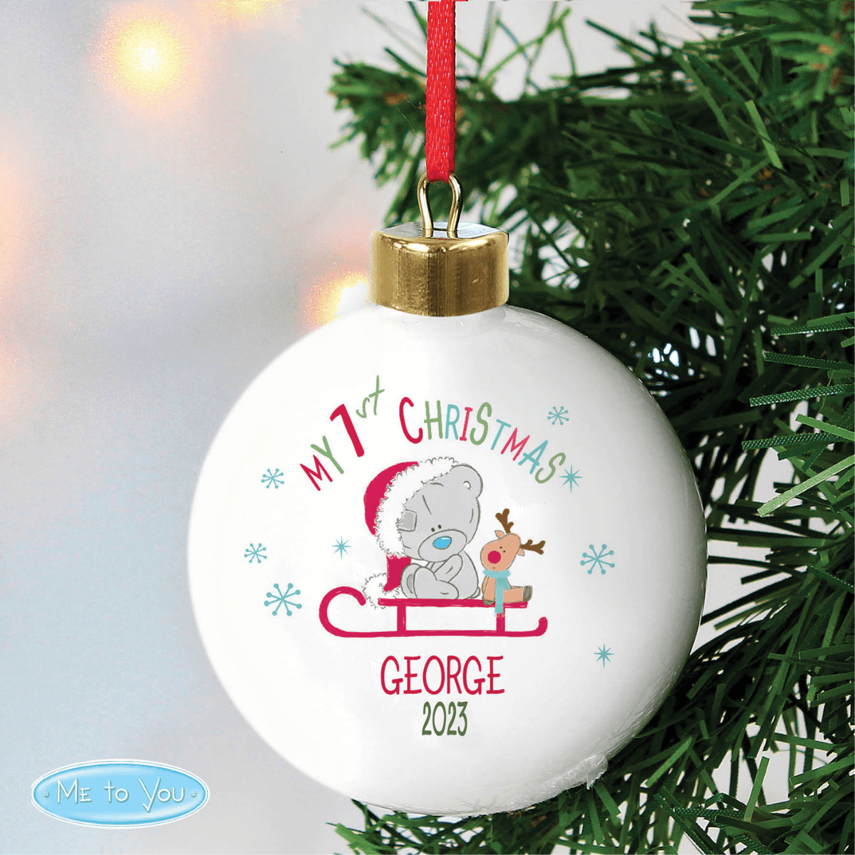 personalised baby's first christmas tiny tatty bauble with a teddy bear on a sledge