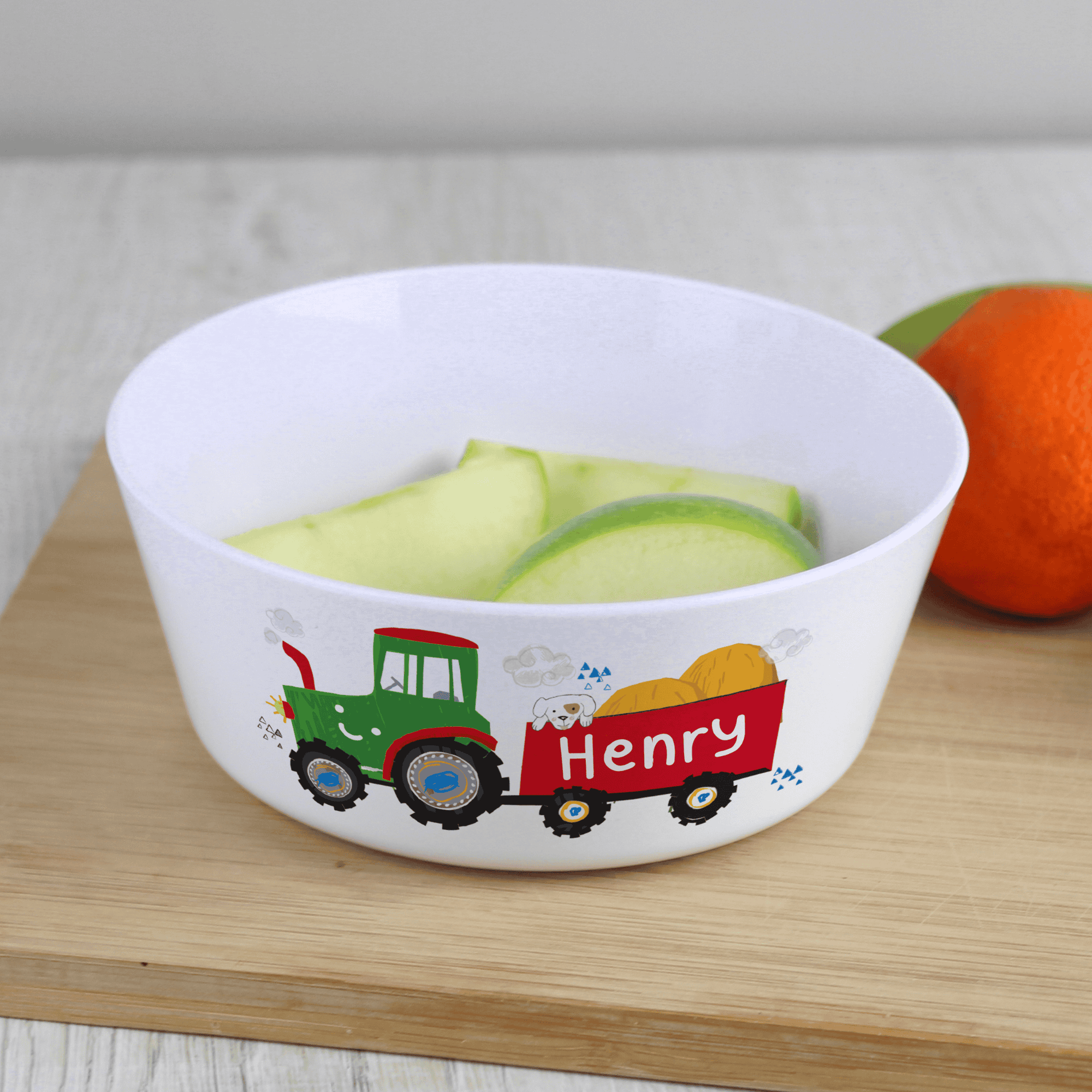 personalised plastic tractor bowl with any name personalised on the trailer image of the tractor
