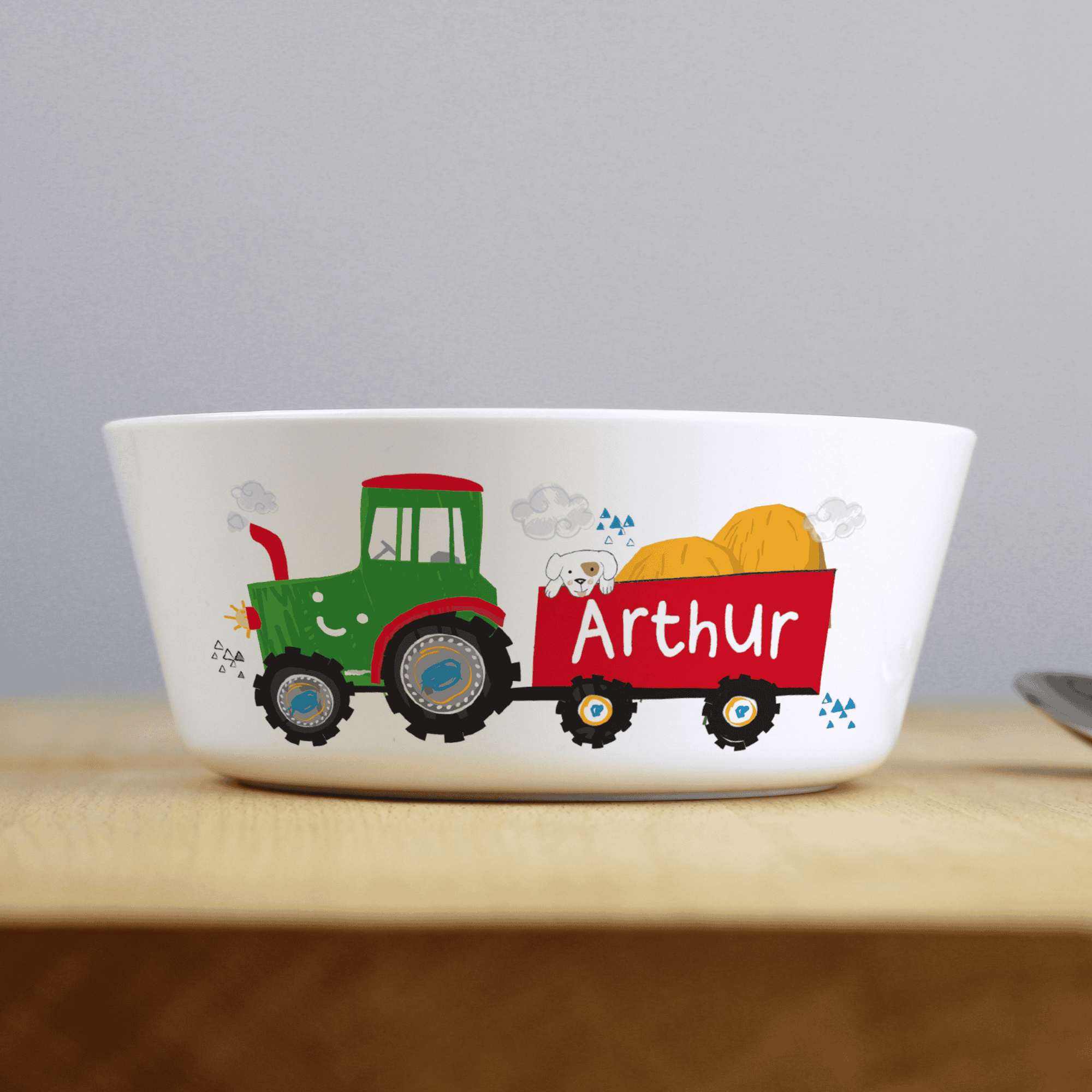 personalised plastic tractor bowl with any name personalised on the trailer image of the tractor