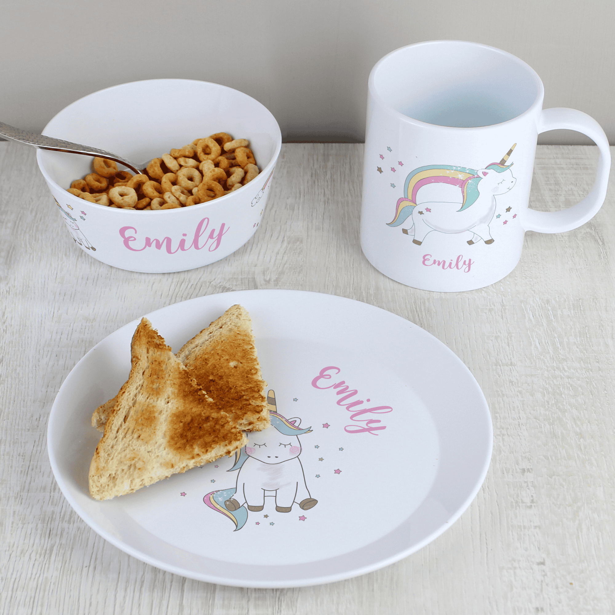 personalised breakfast set with a unicorn desgin each item is personalised with a name