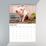 personallised a4 wall calendar of cute animals with the person's name featured in the picture for every month