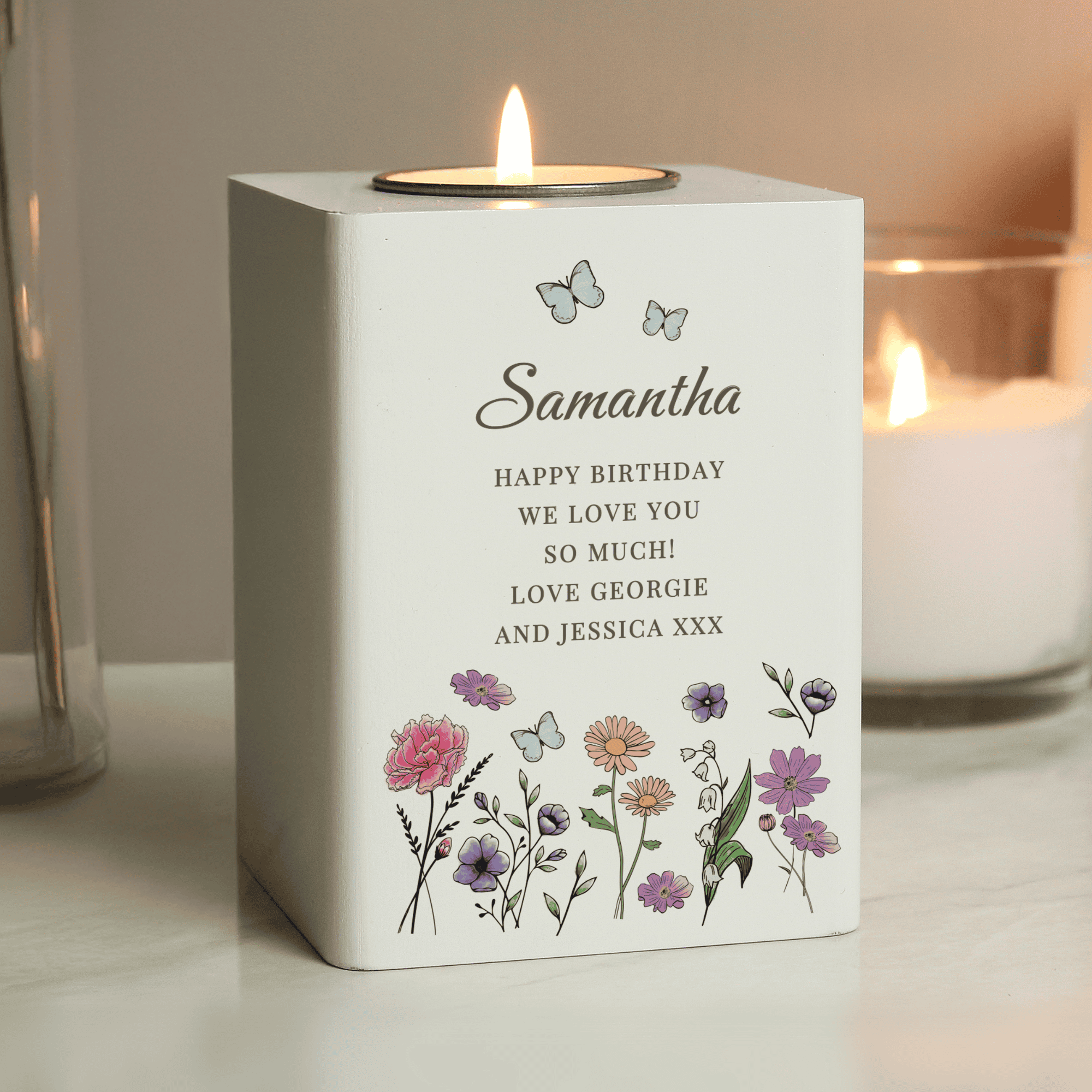 personalised wooden memorial tealight holder with a wild flowers design personalised with a name in larger font and any message over 6 lines