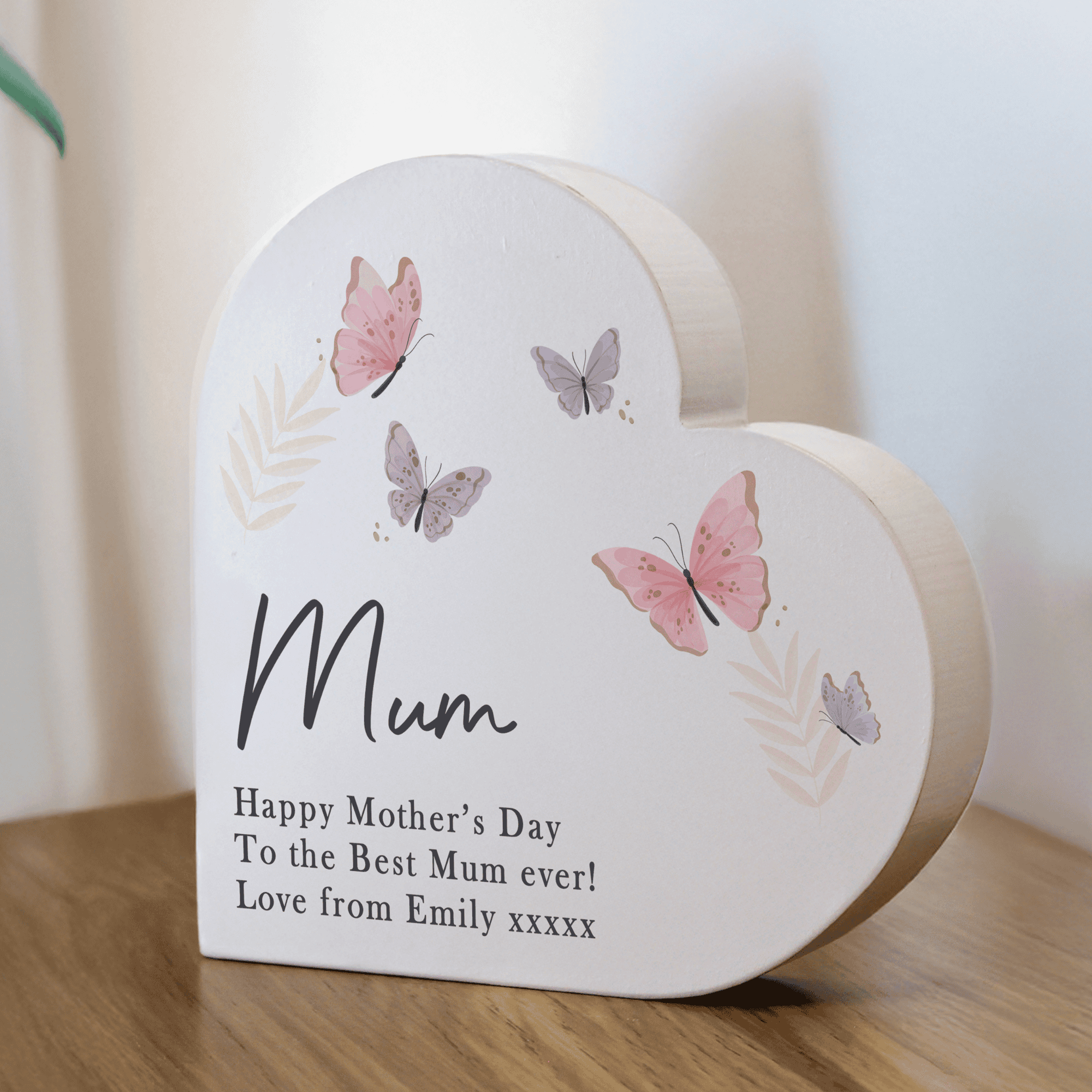 personalised butterfly wooden ornament in a heart shape personalised with a name and any message over 3 lines