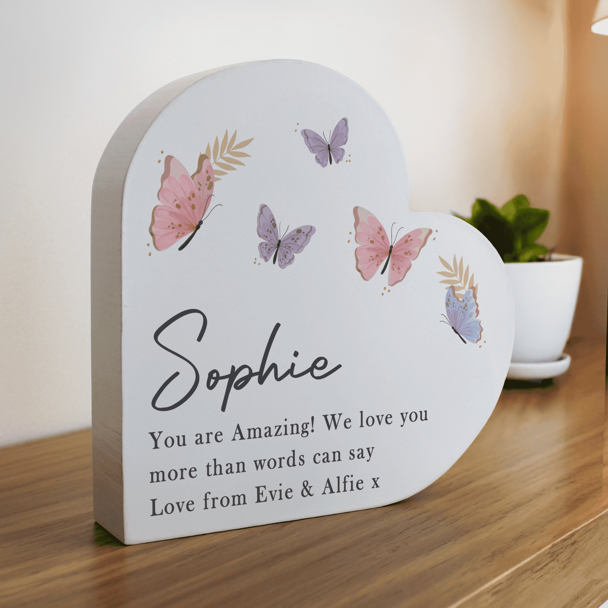 personalised butterfly wooden ornament in a heart shape personalised with a name and any message over 3 lines