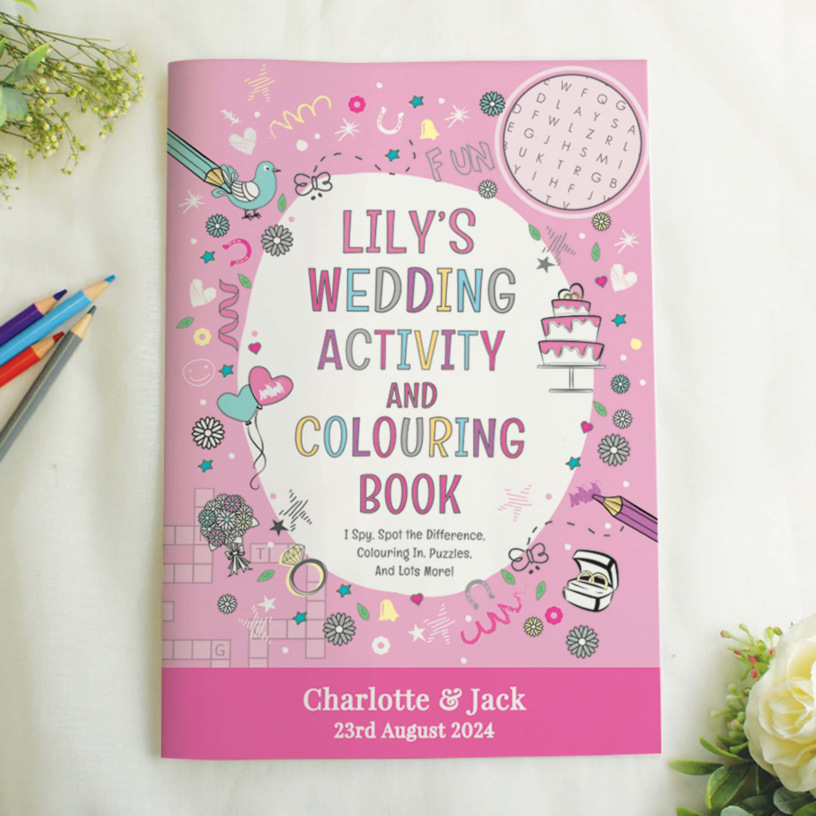 personalised pink wedding acitivity book showing the front cover with the child's name personalised on the cover
