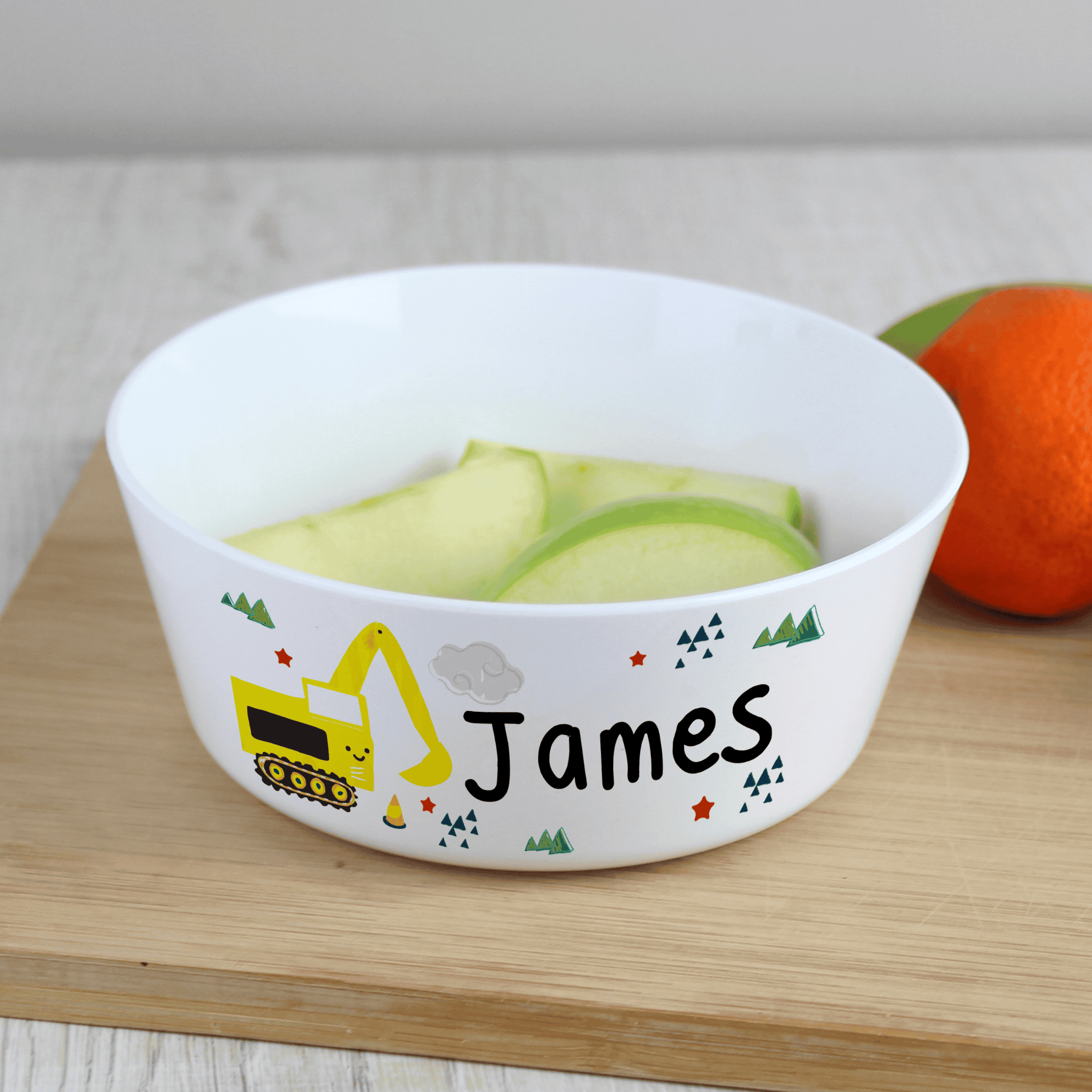 personalised plastic digger bowl with any name personalised on the side beside a digger image
