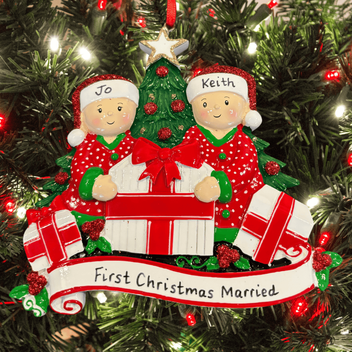 present opening personalised Christmas tree decoration couple
