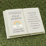 personalised rainbow memorial stone with the persons names and date on the left beside a rainbow image and any message engraved over 8 lines on the right hand side