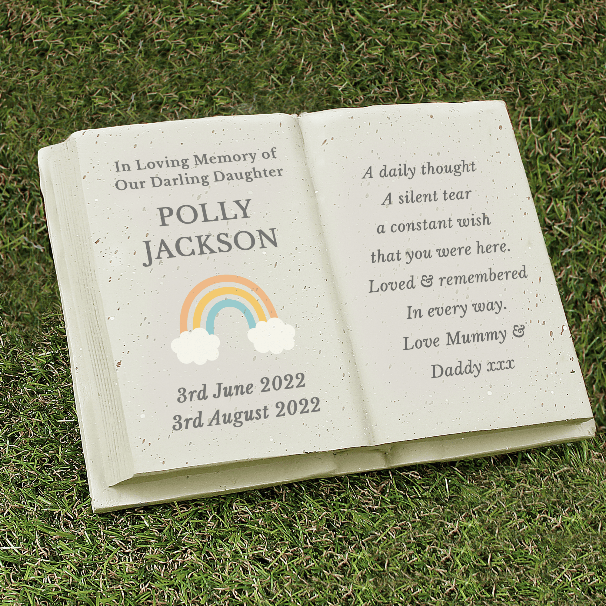 personalised rainbow memorial stone with the persons names and date on the left beside a rainbow image and any message engraved over 8 lines on the right hand side