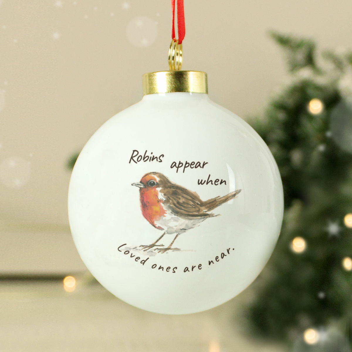 personalised ceramic robin memorial bauble showing the front