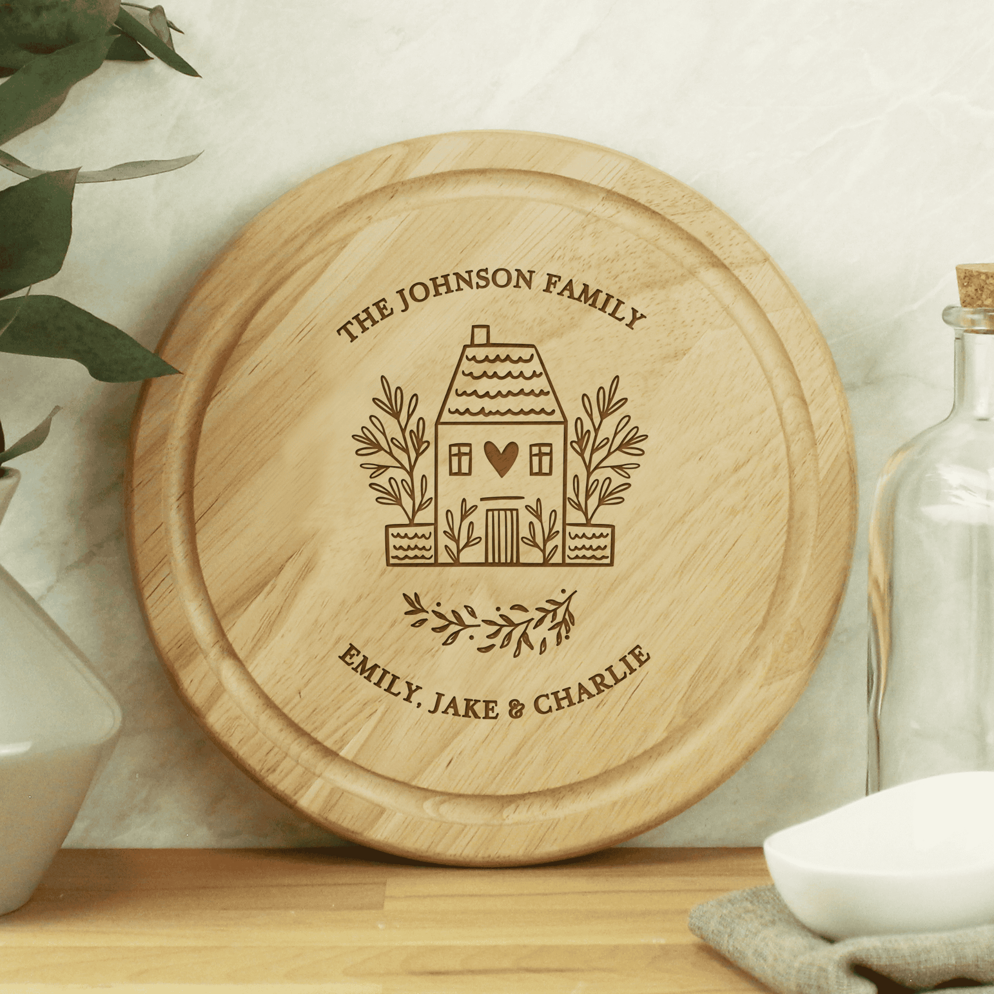personalised round wooden HOME chopping board engraved with a message over 2 lines